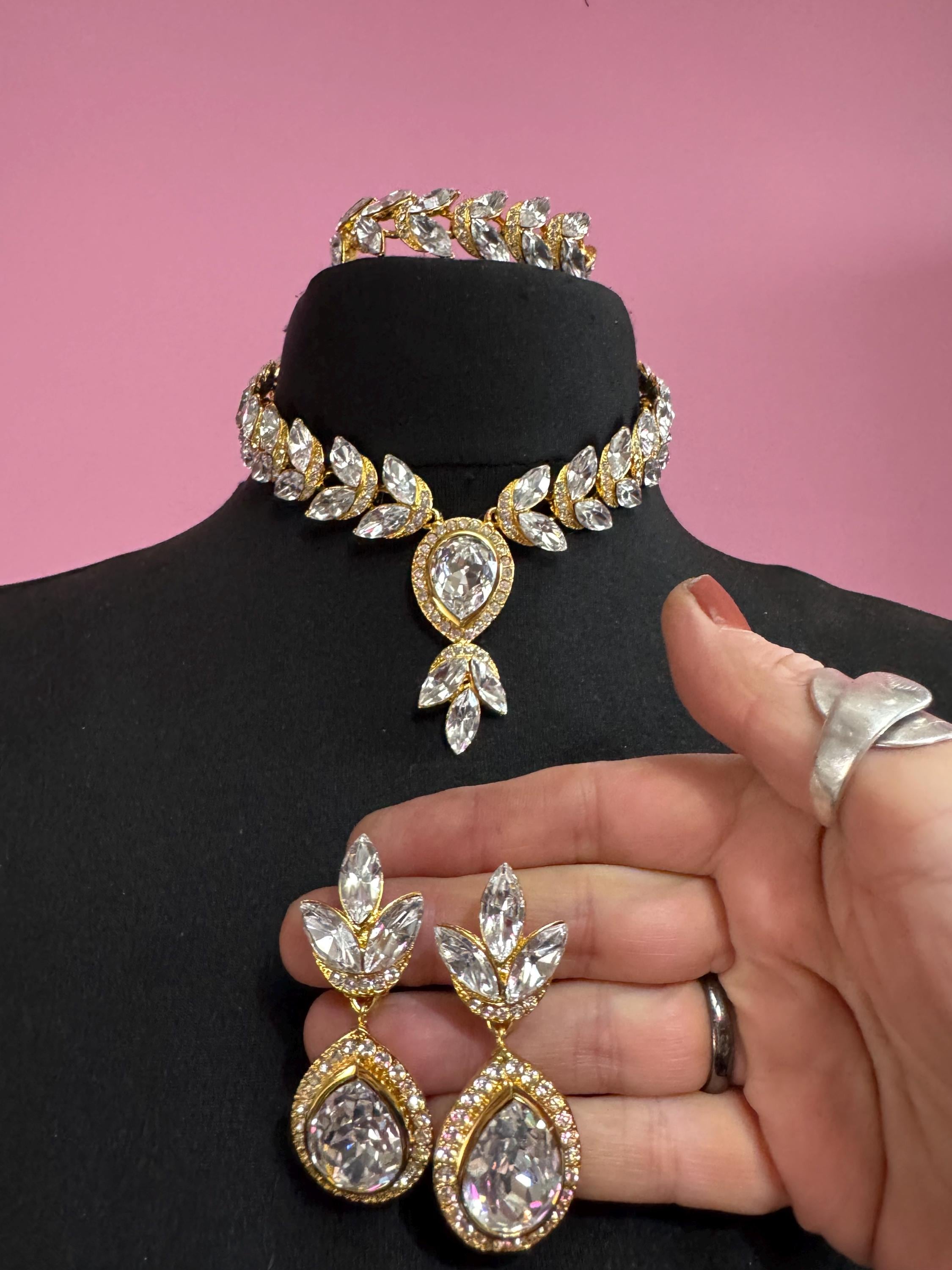 Vintage clear Swarovski crystal jewellery set, necklace,bracelet and clip on earrings.