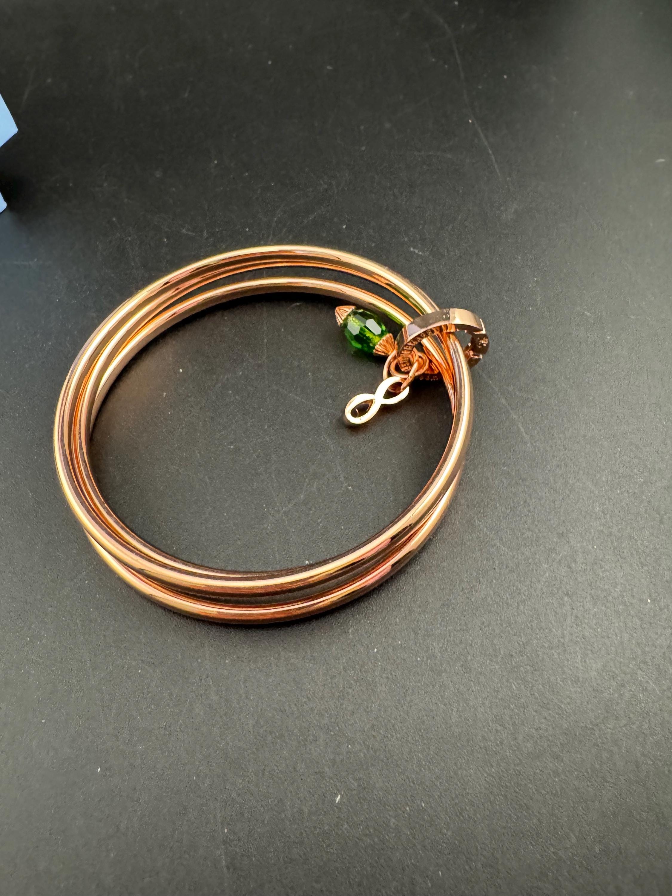 NEWBRIDGE triple rose gold plated birthstone bangles, May birthday emerald beads