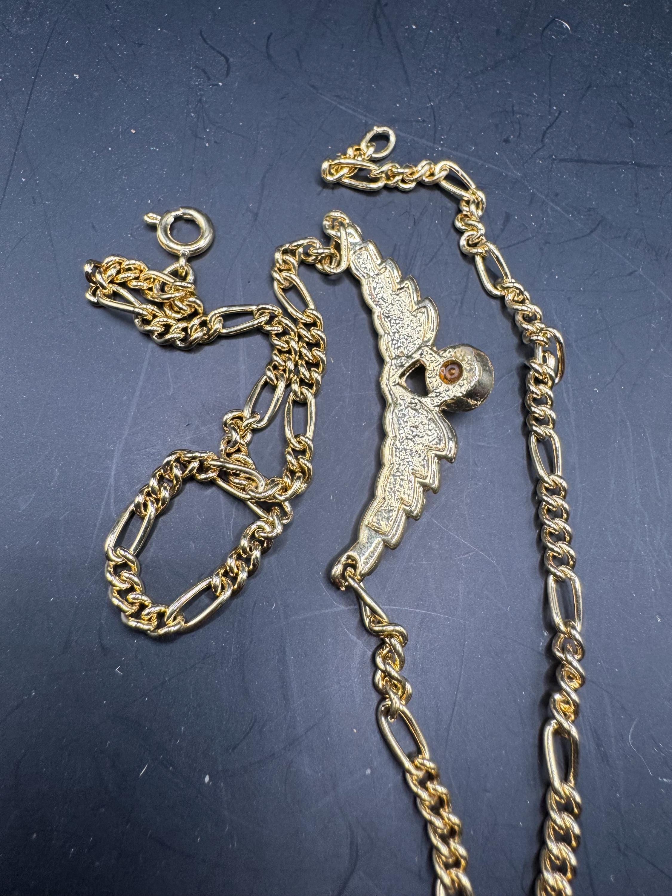 Gold Tone Figaro Chain emerald Necklace: Green Rhinestone