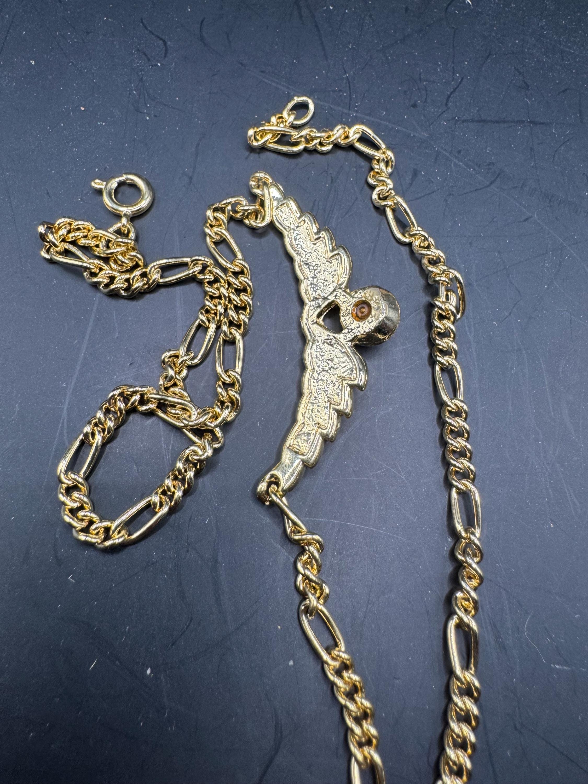 Gold Tone Figaro Chain emerald Necklace: Green Rhinestone