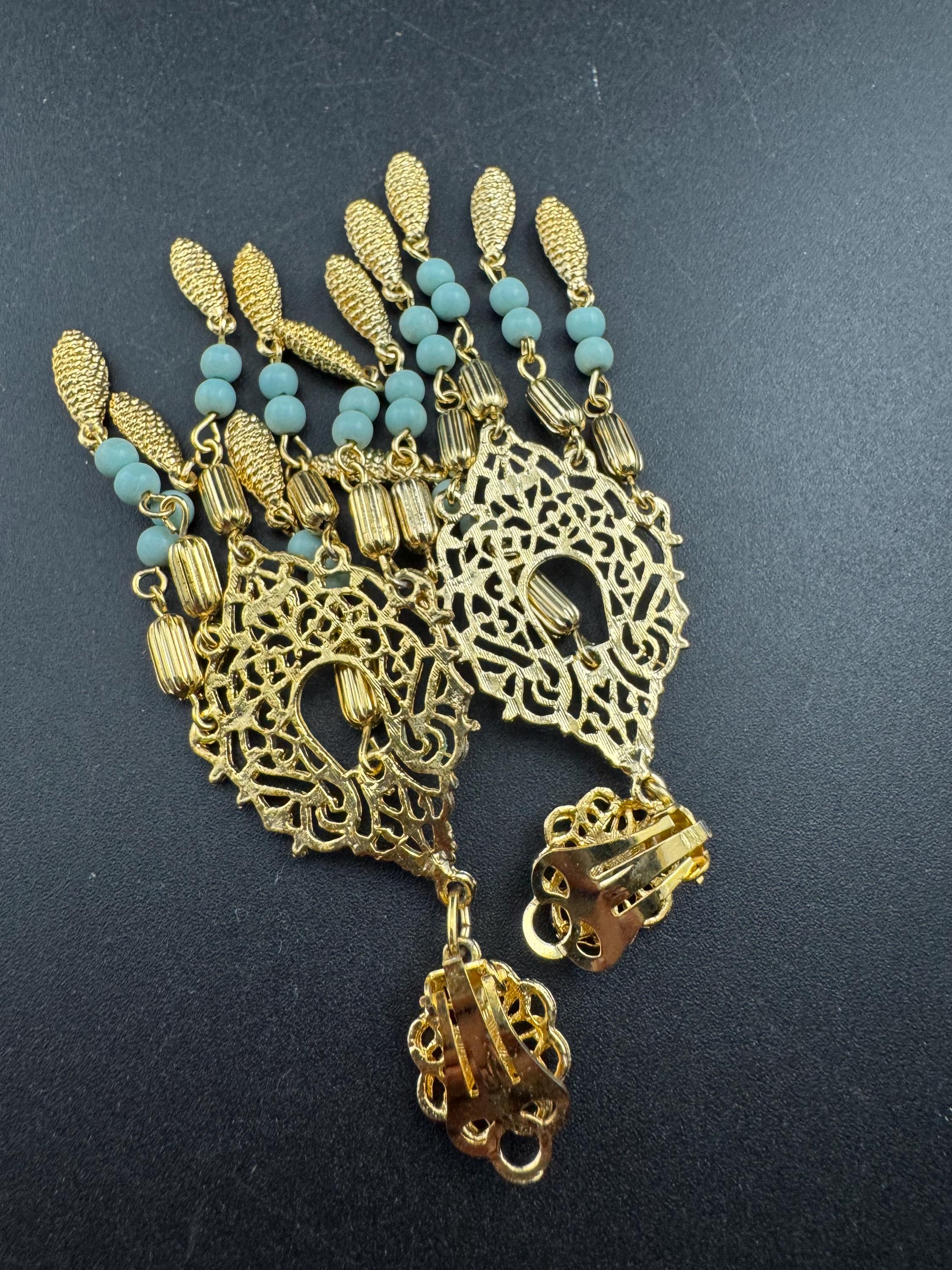 Oversized 9cm gold and turquoise beaded long articulated dangly clip on earrings