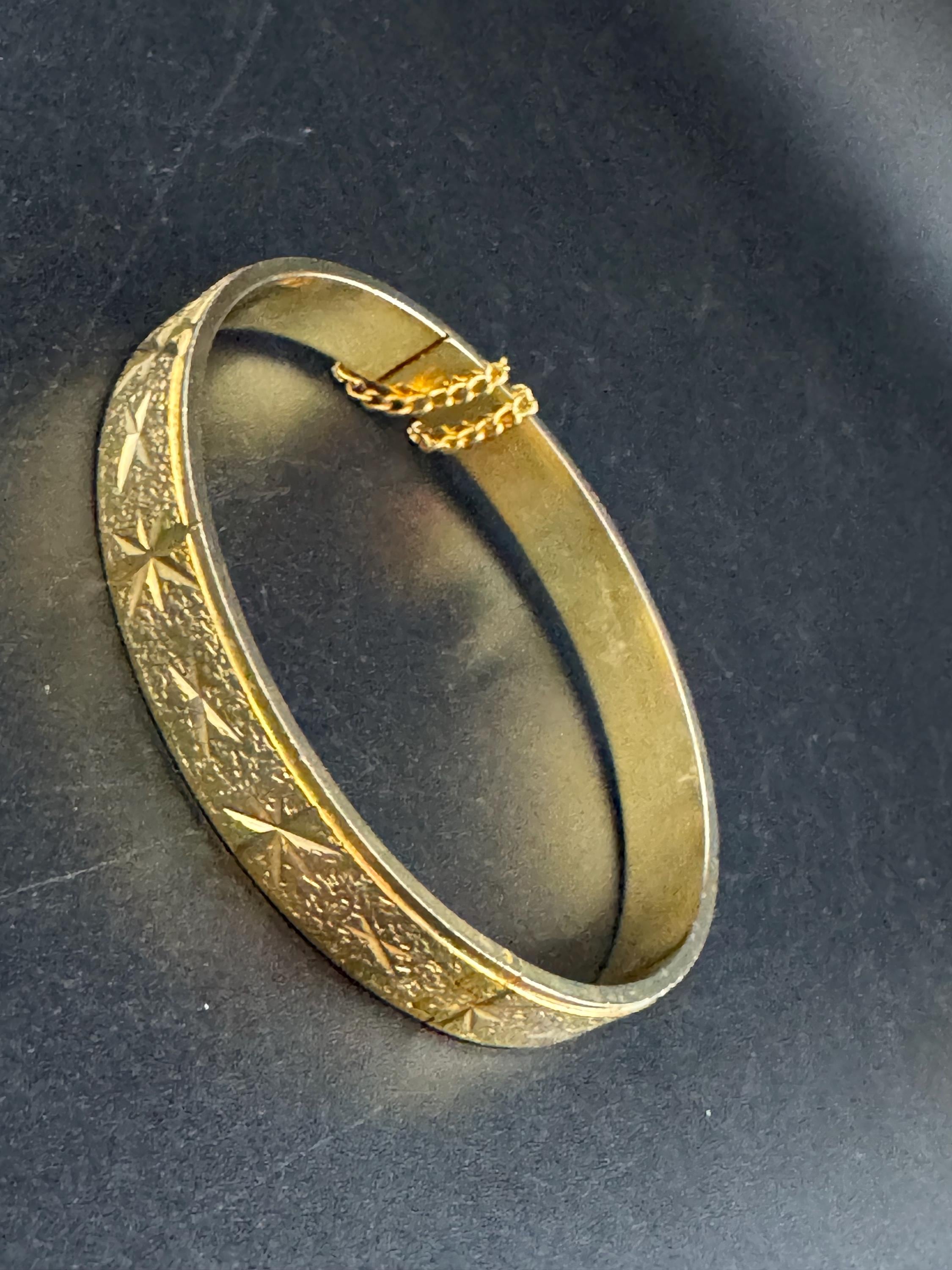 Vintage Gold plated etched Bangle, hinged 1970s with safety chain