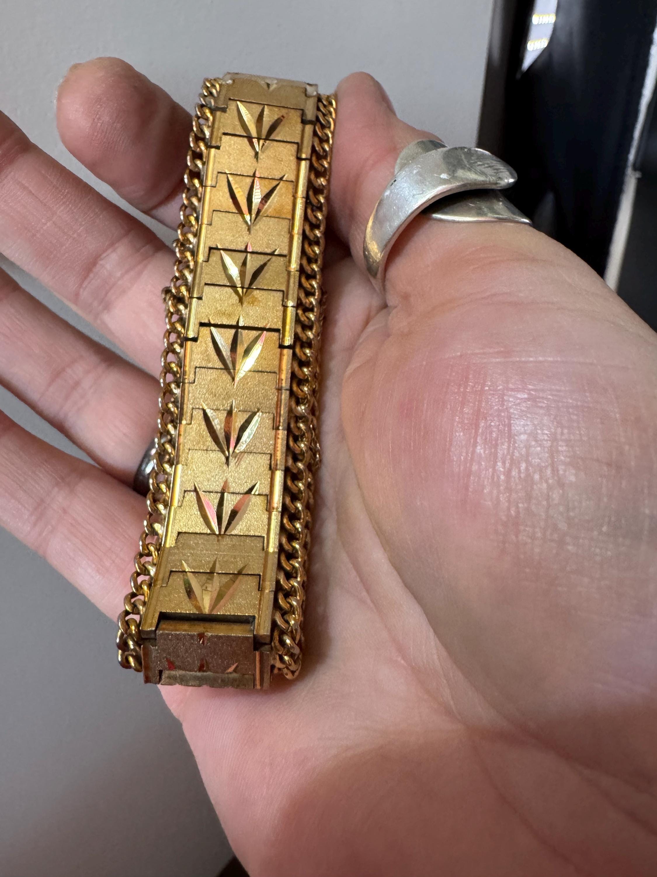 1970s flat wide etched bracelet, gold plated chain edged with safety chain