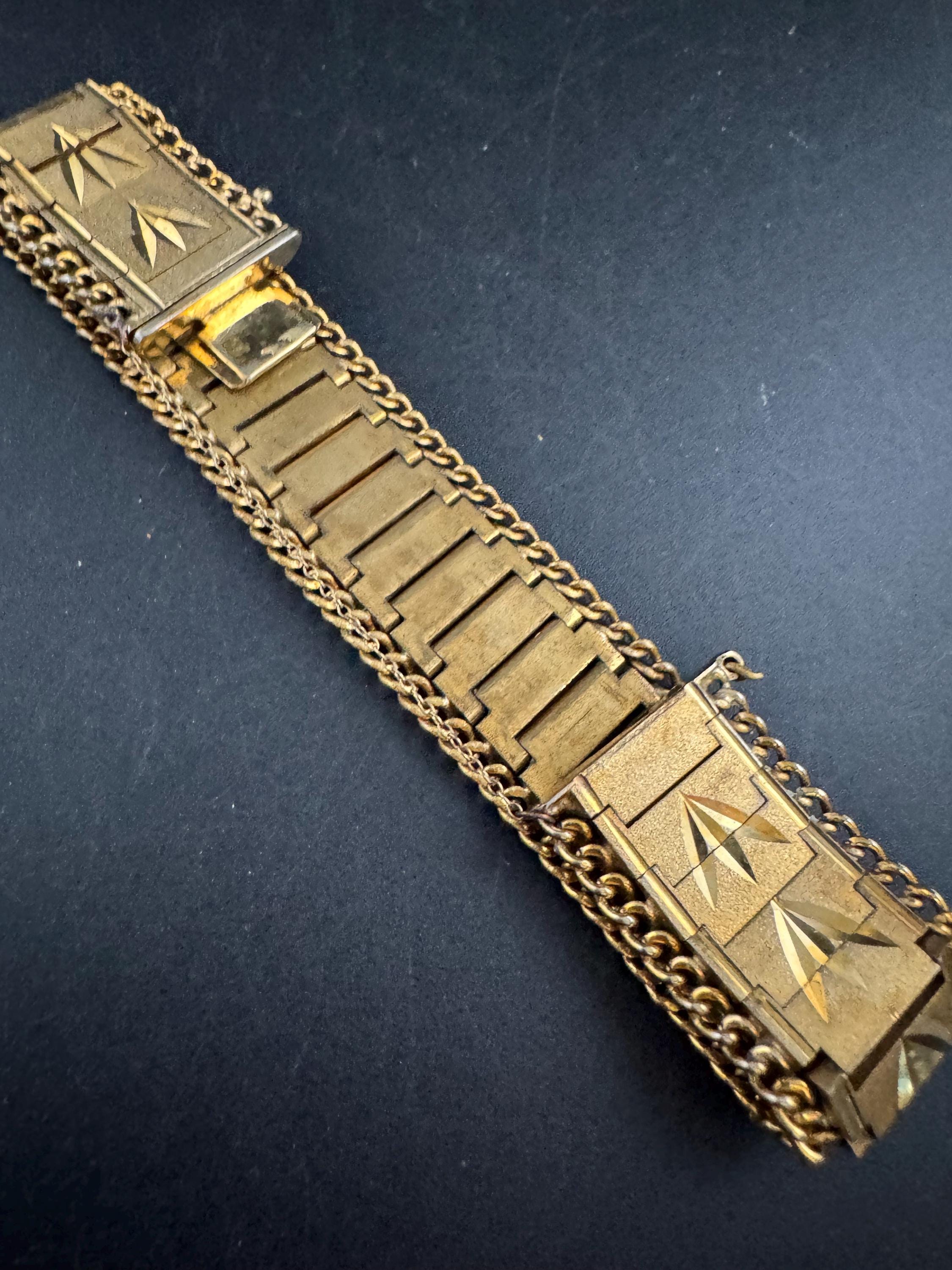 1970s flat wide etched bracelet, gold plated chain edged with safety chain
