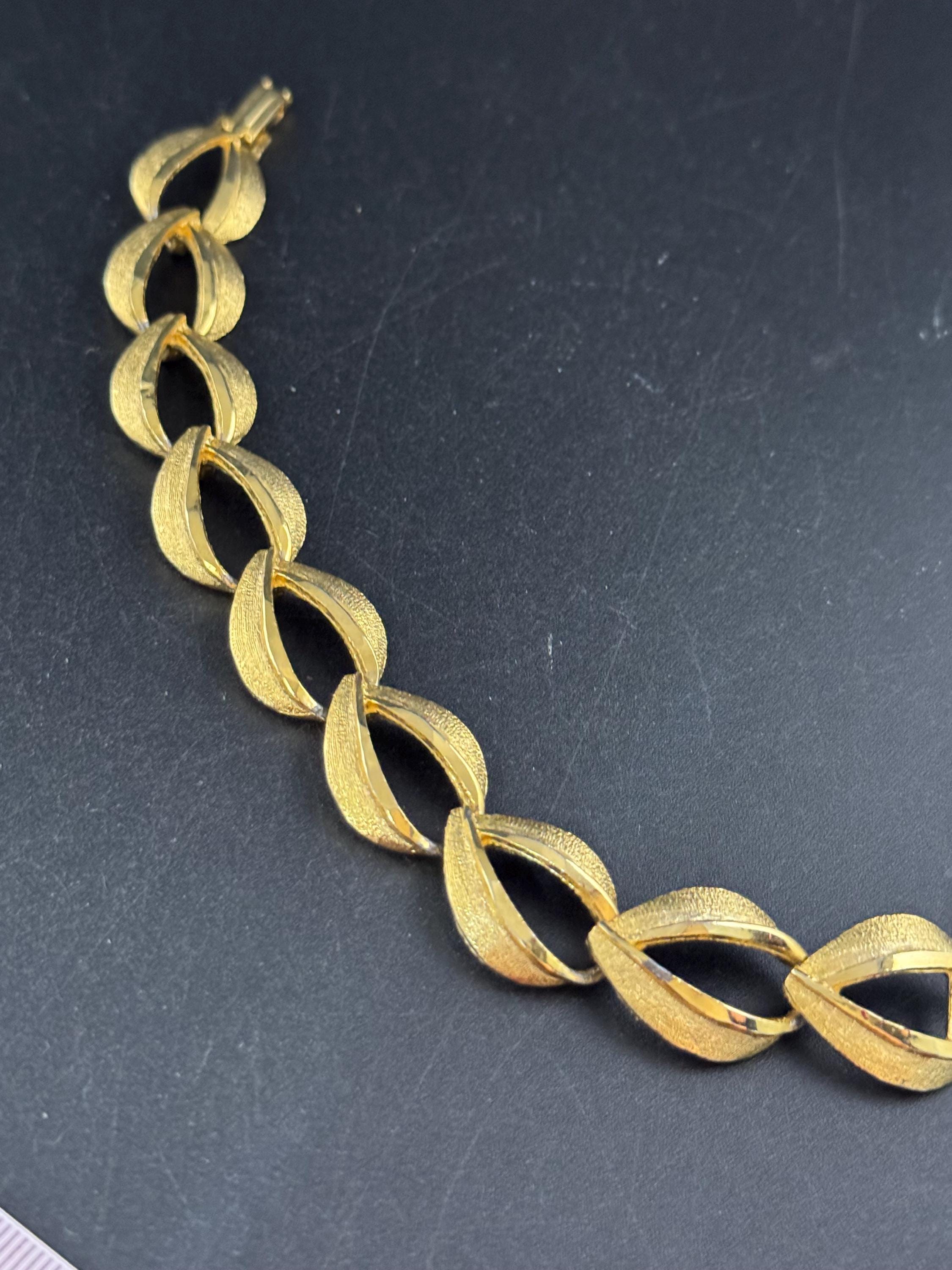 Gold panel link bracelet, modernist period mid century