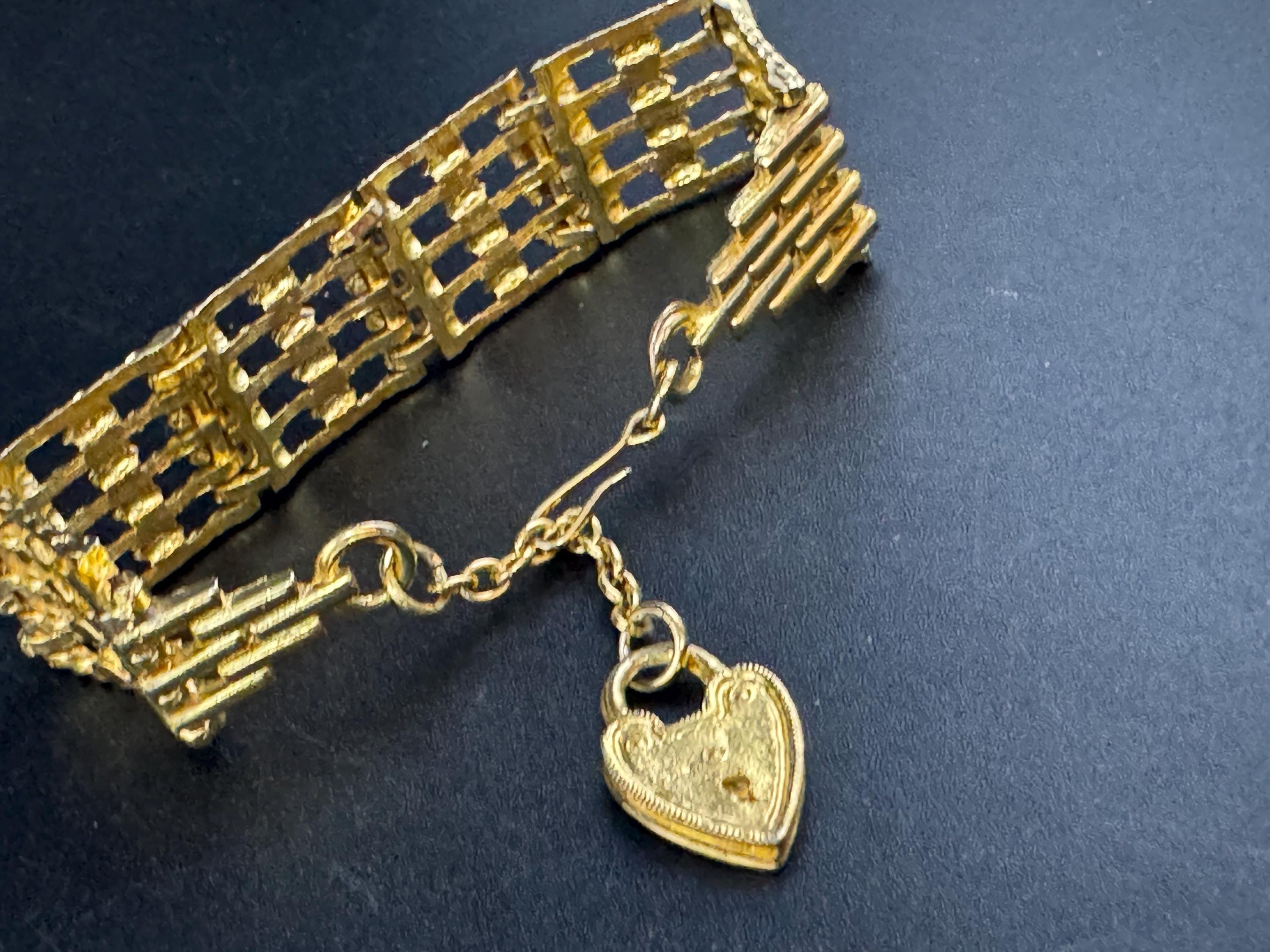 Retro 5 bar gate bracelet with heart padlock, gold tone