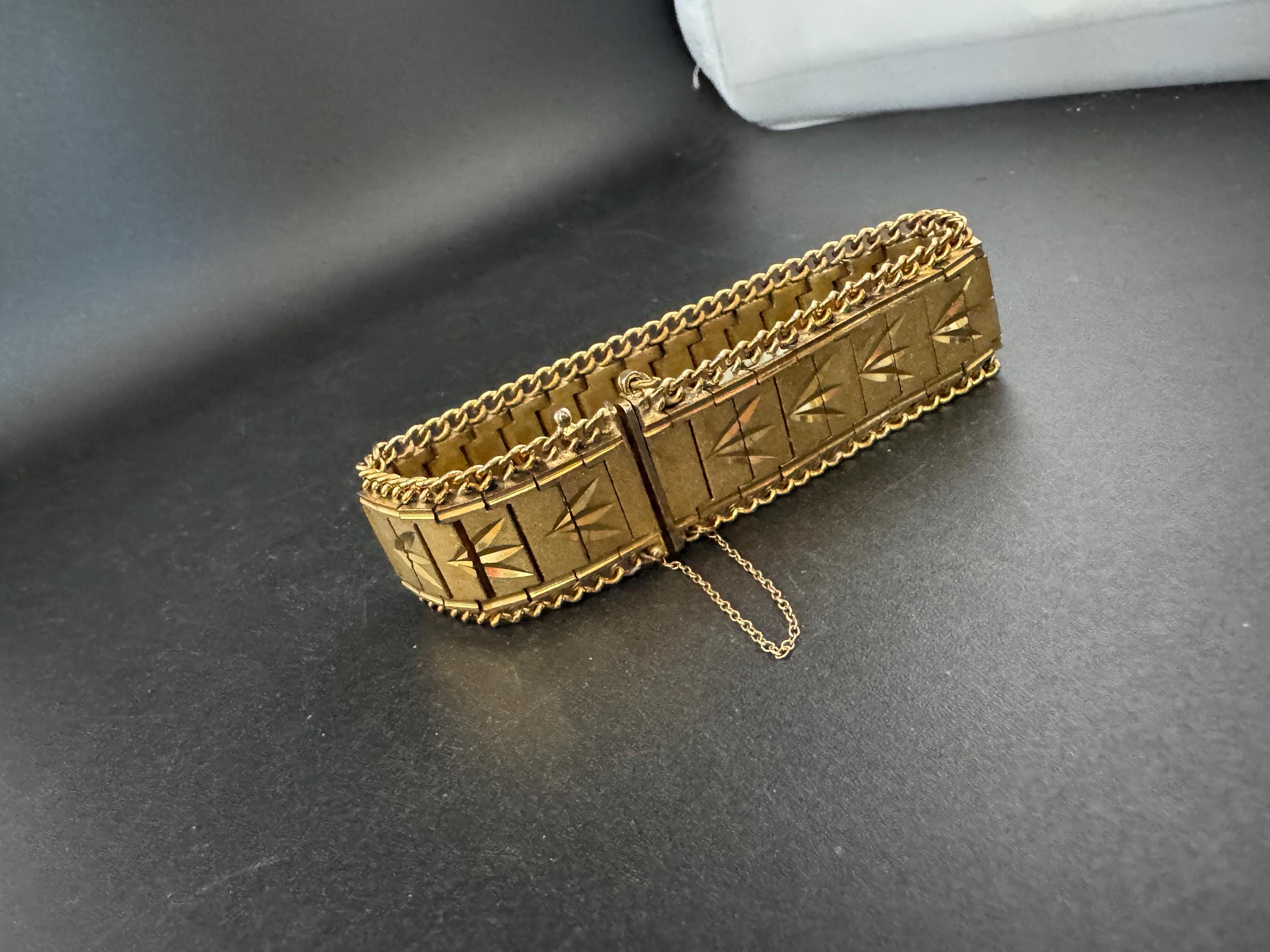 1970s flat wide etched bracelet, gold plated chain edged with safety chain