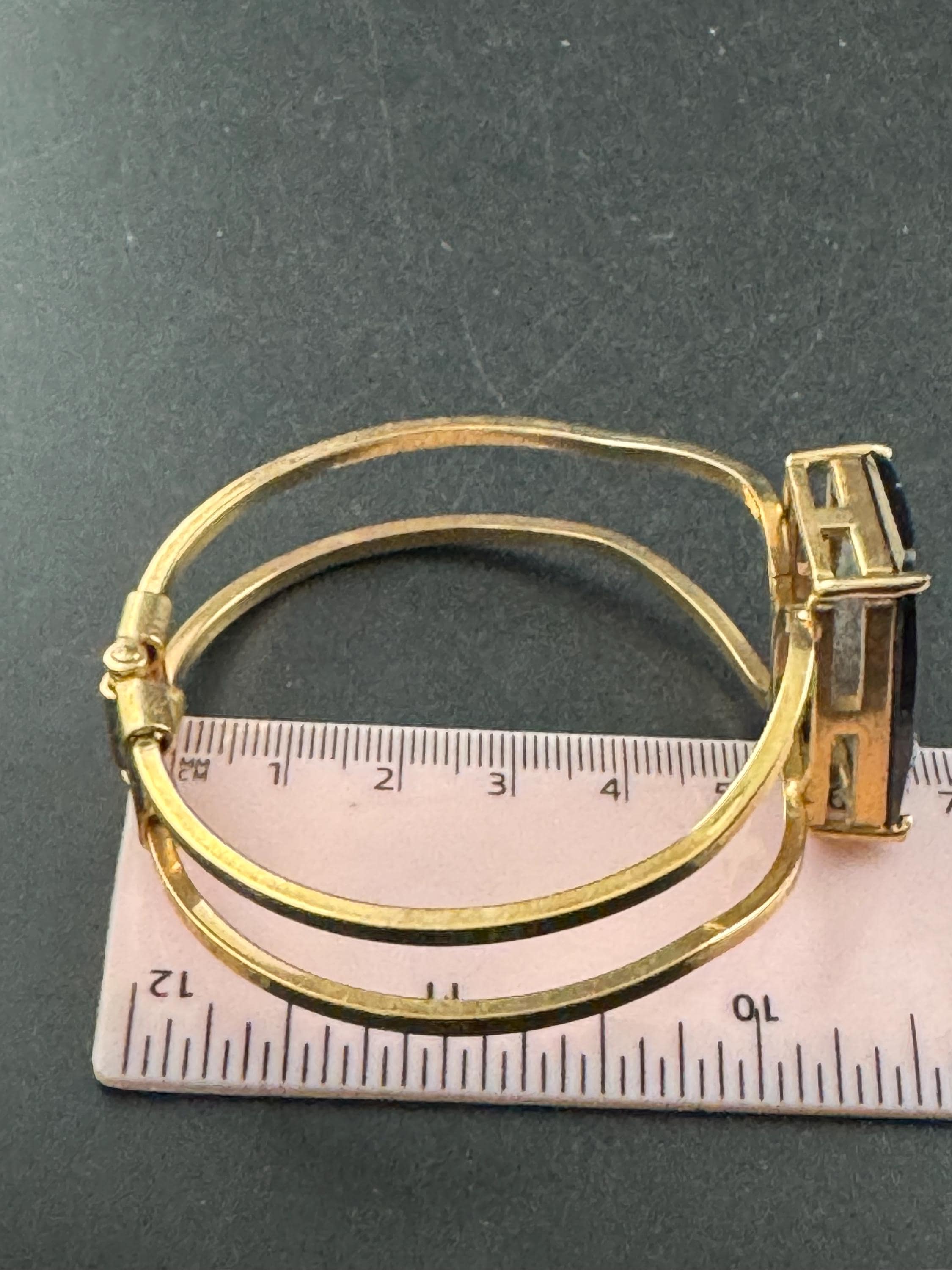 Black glass diamanté clamper bangle, gold tone geometric