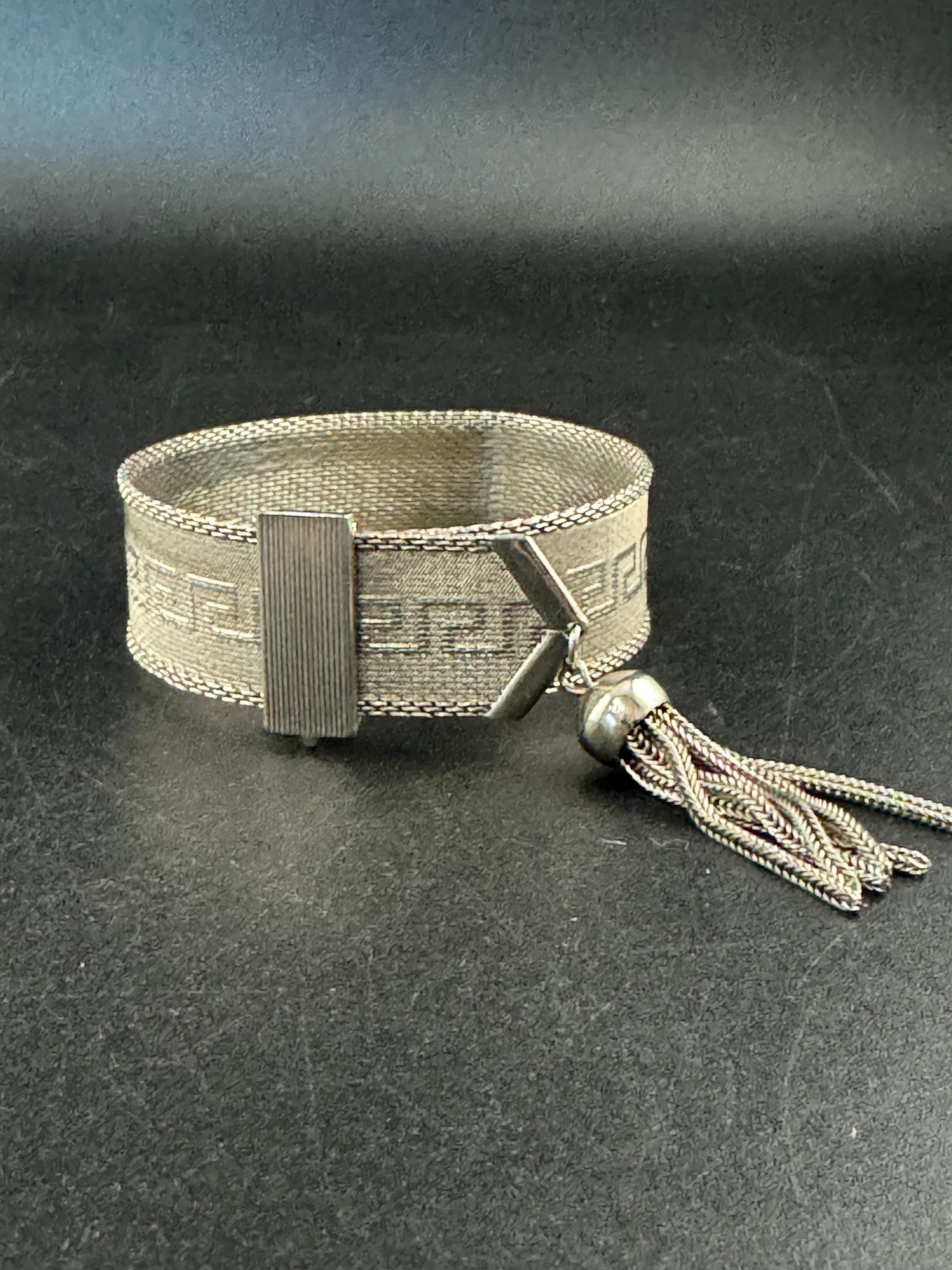 1970s GREEK KEY mesh tassel bracelet , silver plated vintage