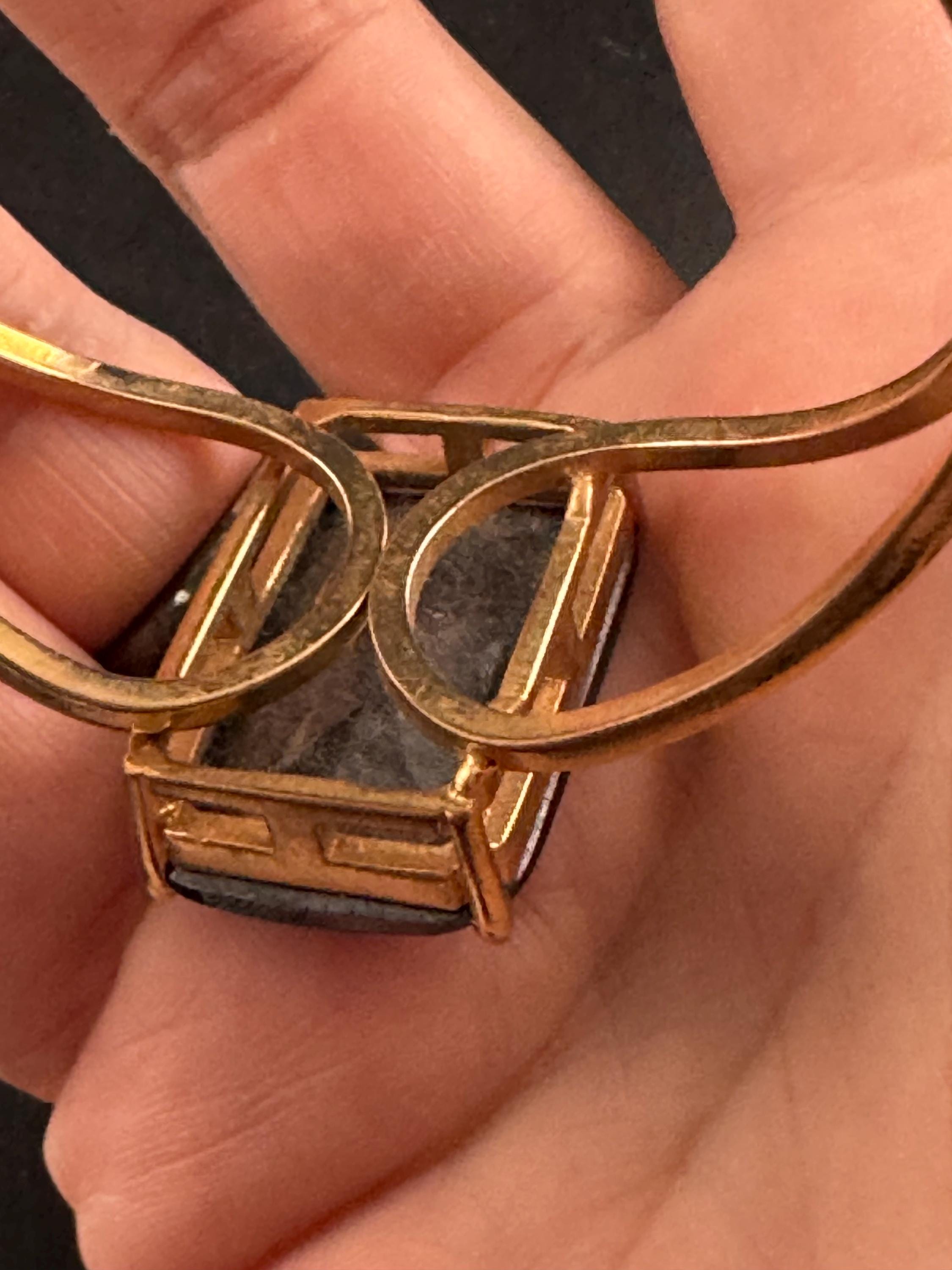 Black glass diamanté clamper bangle, gold tone geometric