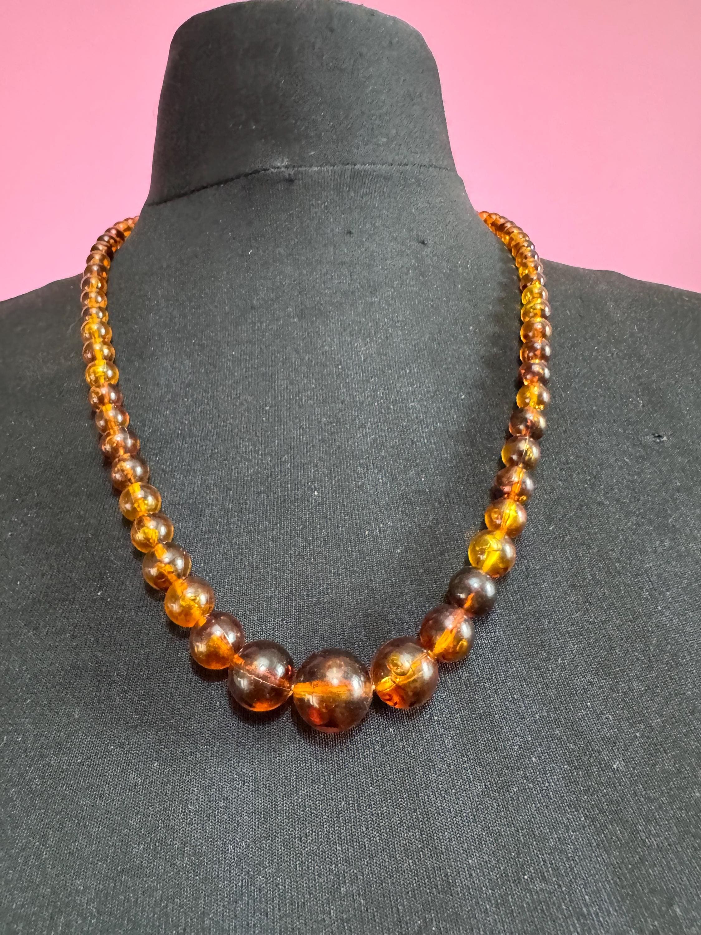 Long Faux Amber orange brown beaded necklace, plastic beads