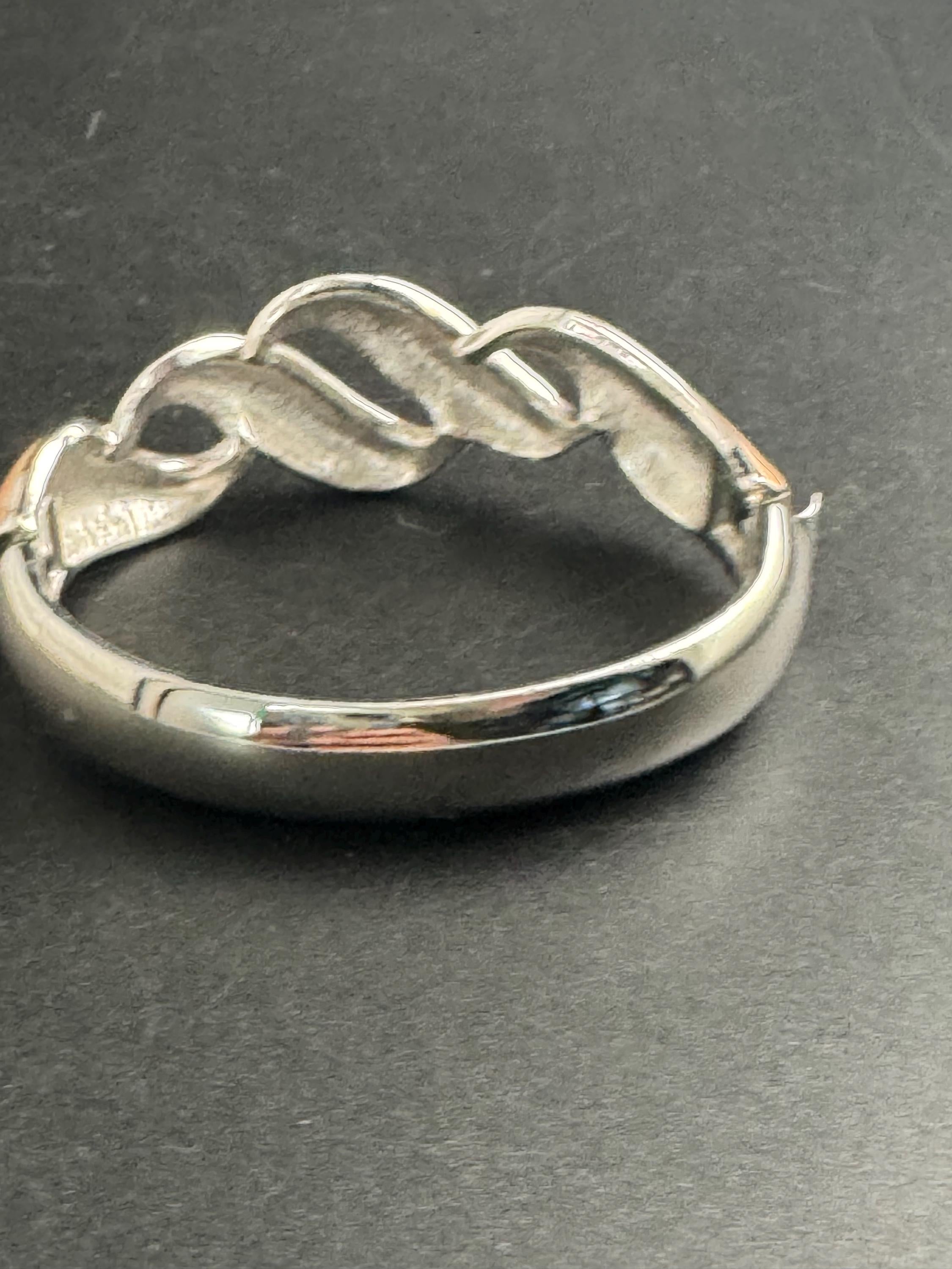 Beige enamel Monet bangle , silver tone clamper and signed