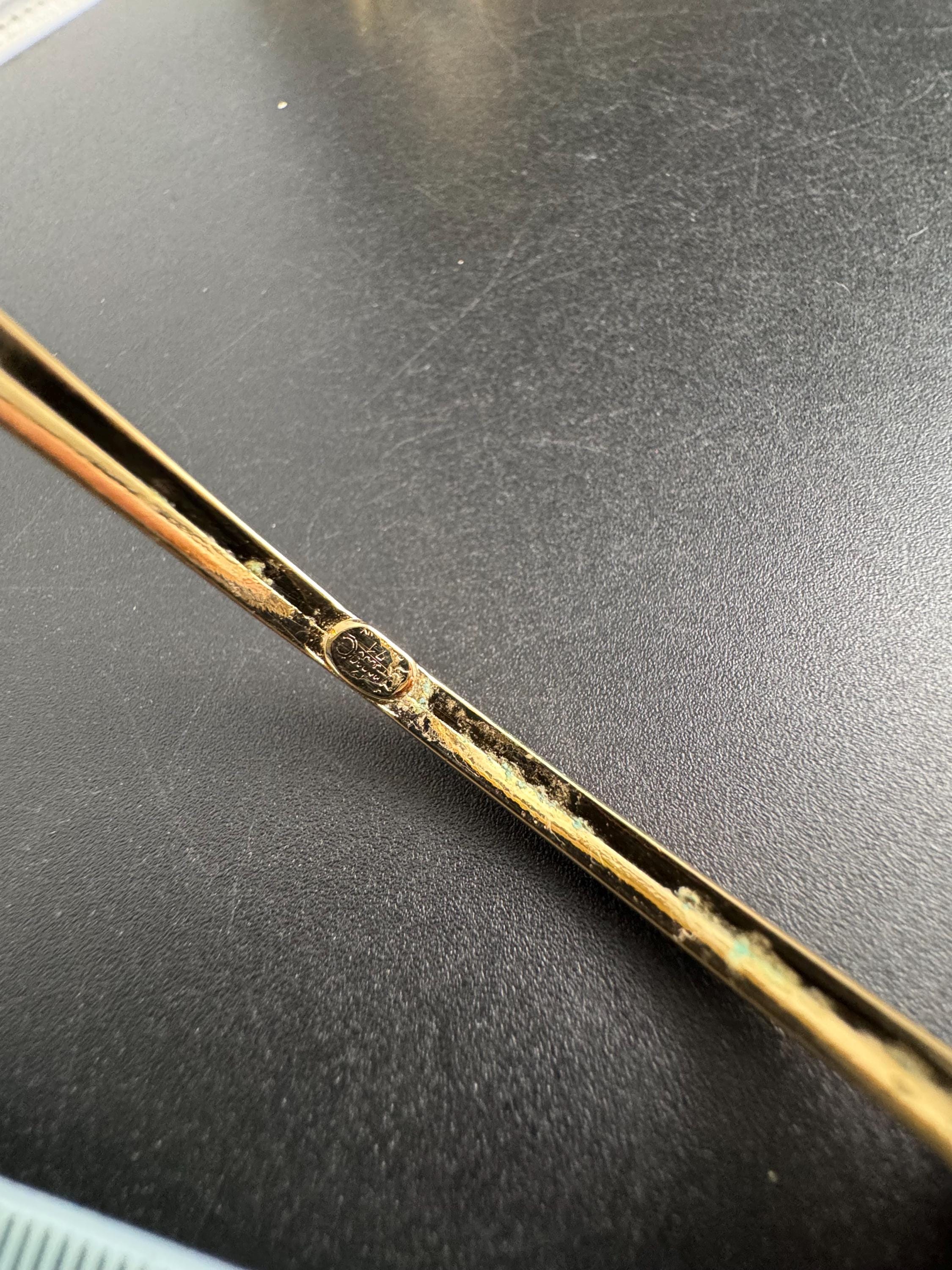 Grosse gold plated slim bangle dated 1971 , 1970s designer bracelet signed jewellery