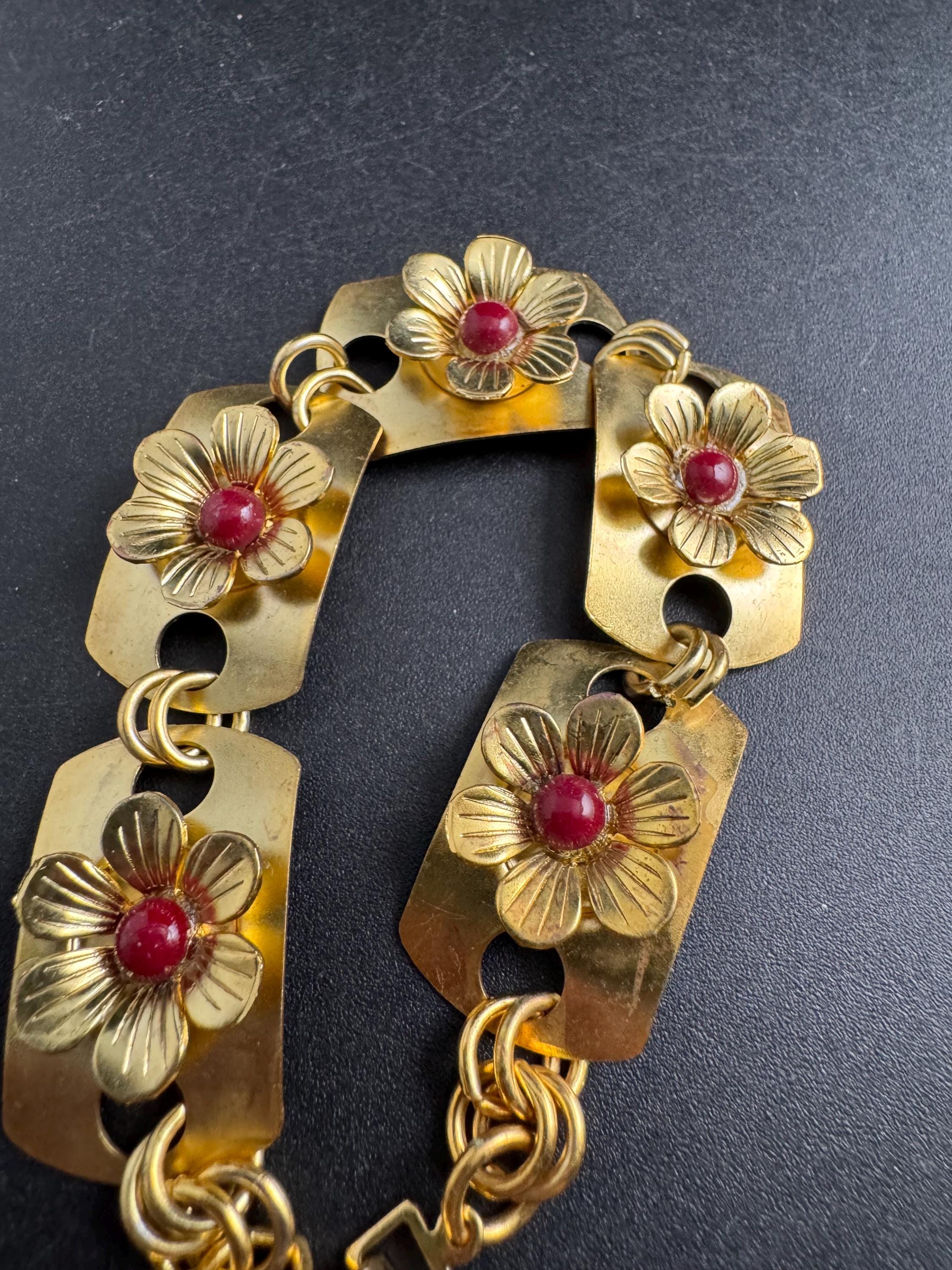 Art deco brass panel link flower bracelet , red cabochons vintage unused mid century