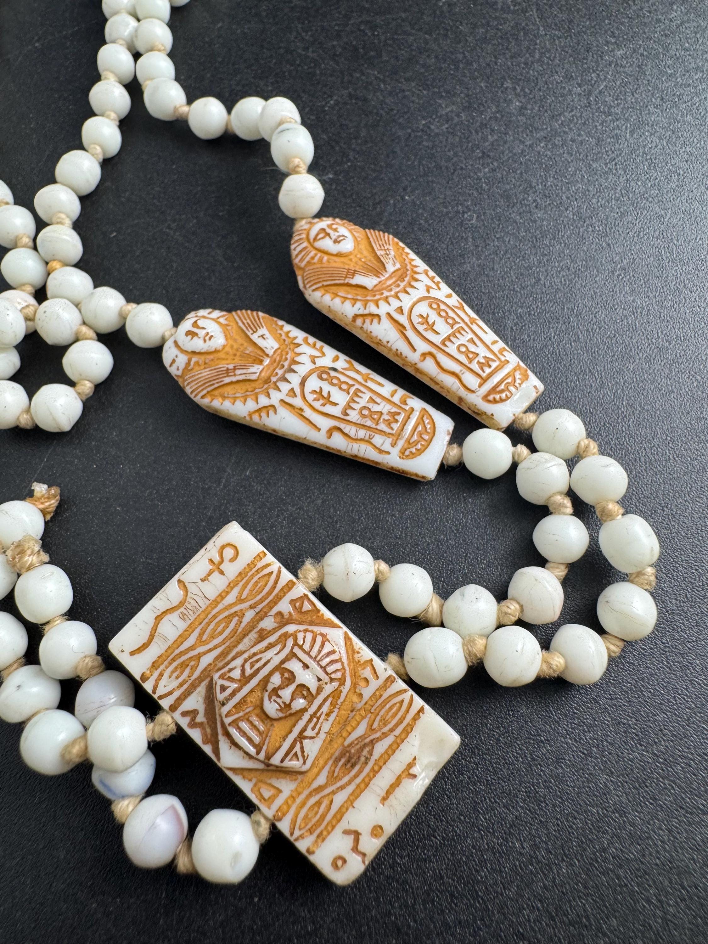 neiger UV coffin necklace, cream beads 84cm uranium glass