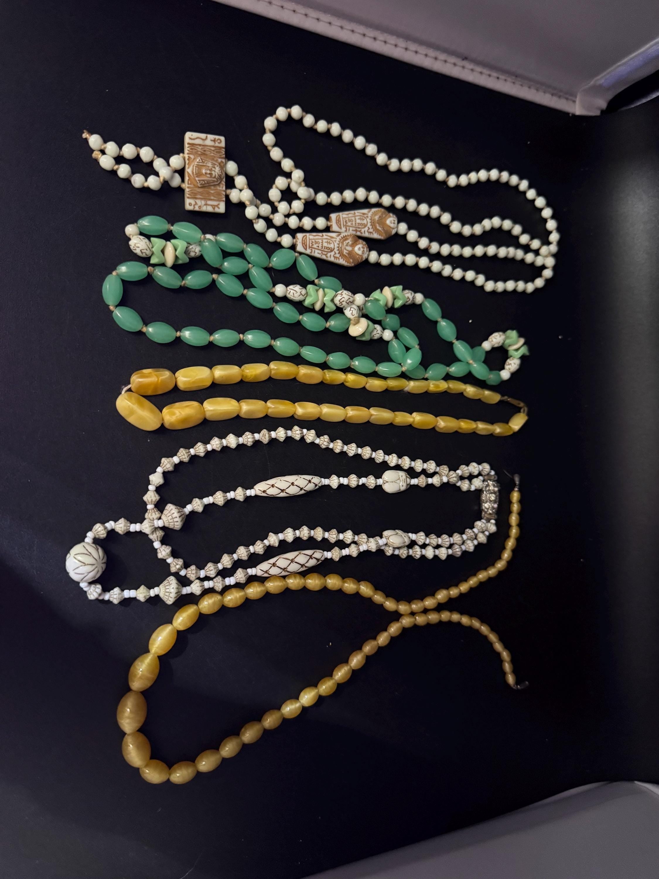 neiger UV coffin necklace, cream beads 84cm uranium glass