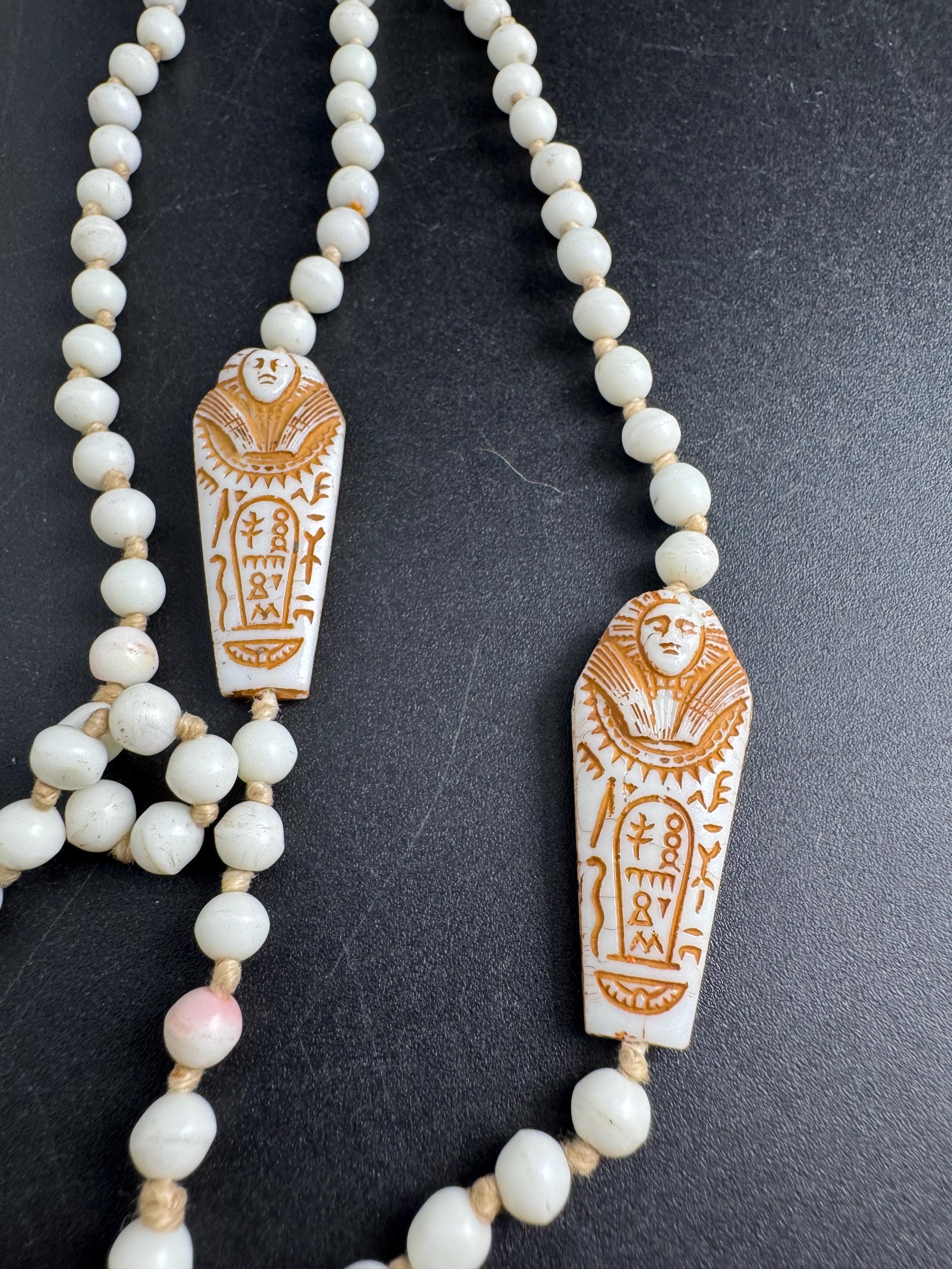 neiger UV coffin necklace, cream beads 84cm uranium glass