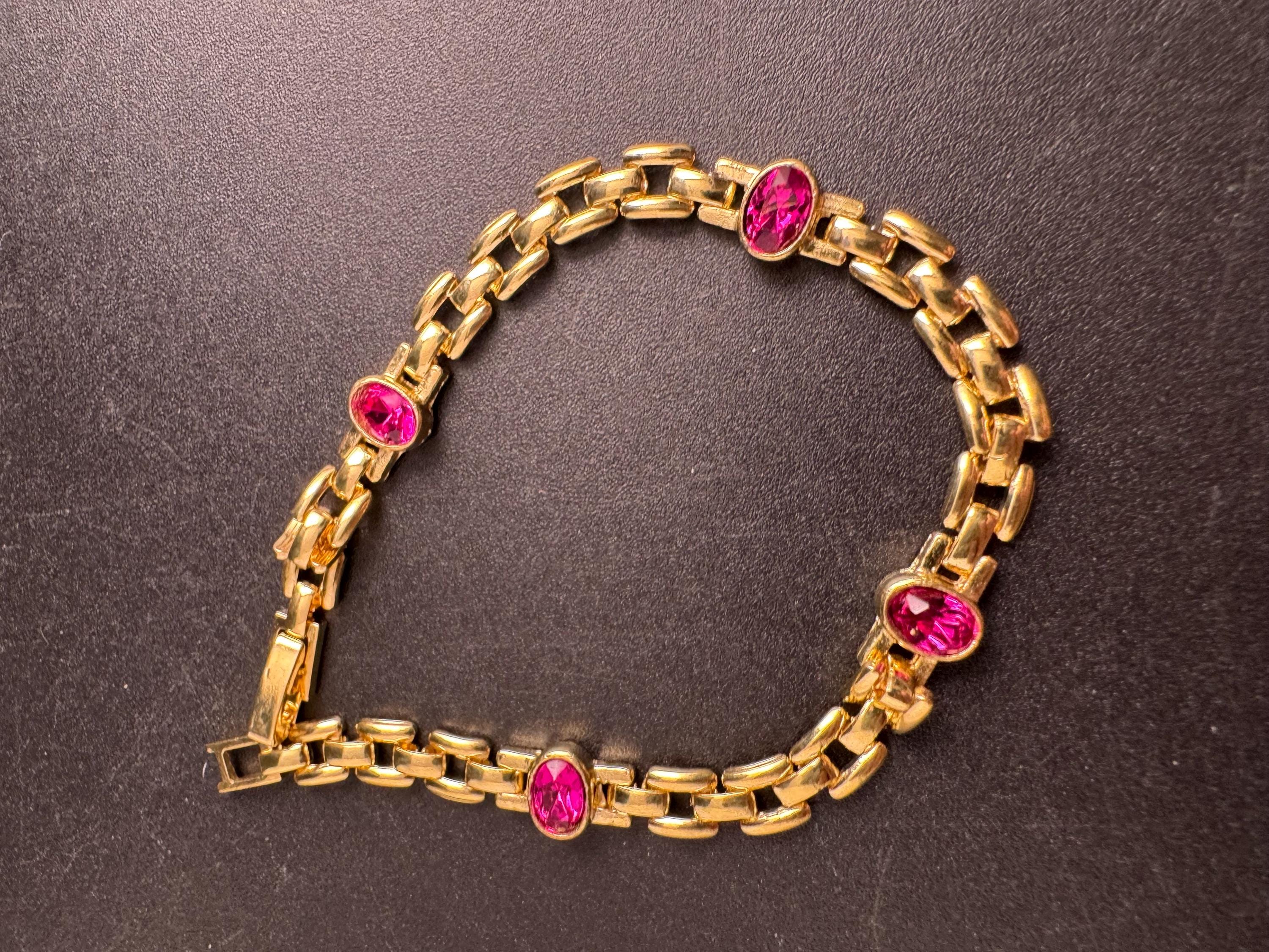 Slim Panther link rhinestone bracelet, bright pink oval cabochon crystals gold plated