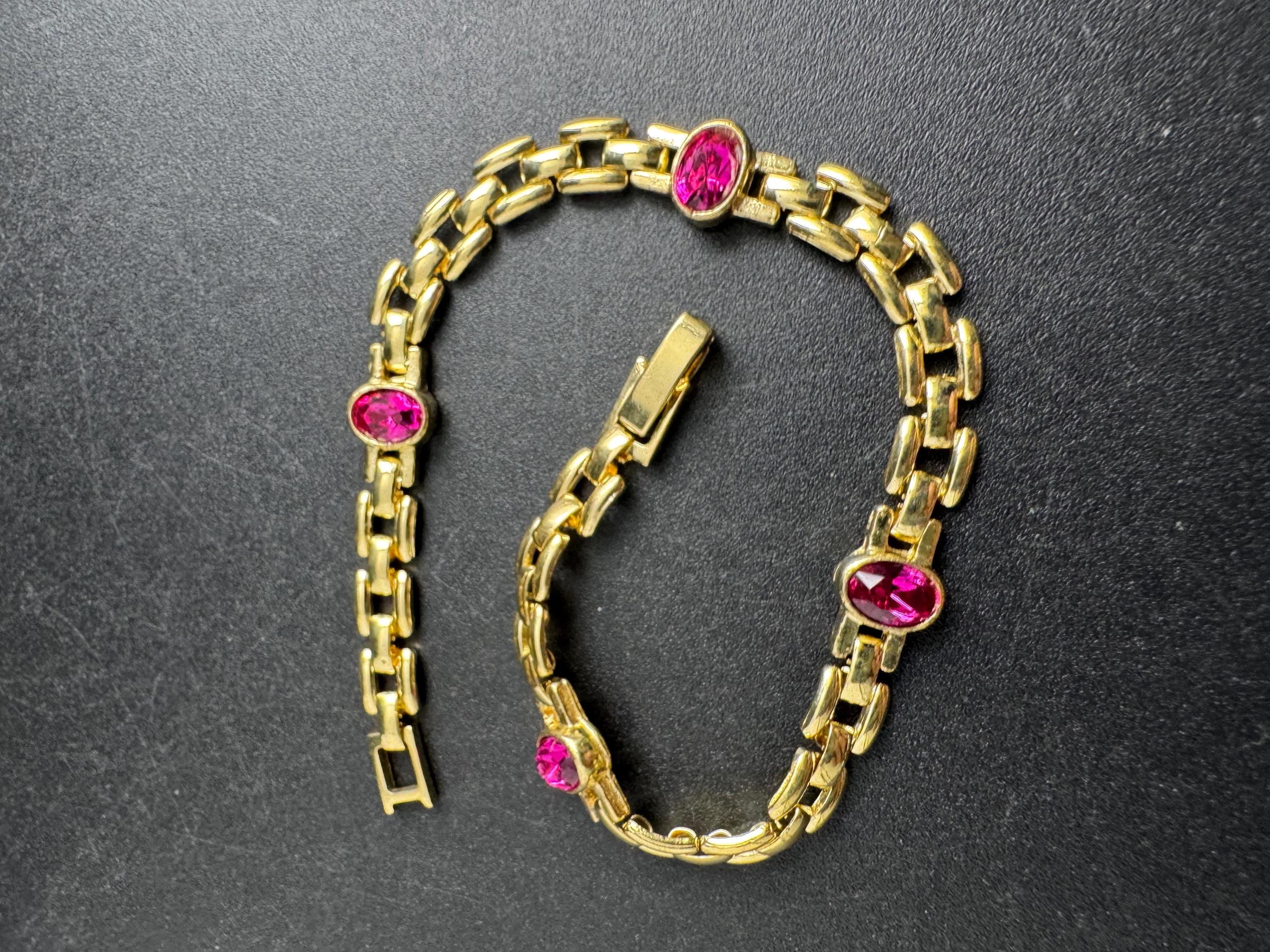 Slim Panther link rhinestone bracelet, bright pink oval cabochon crystals gold plated