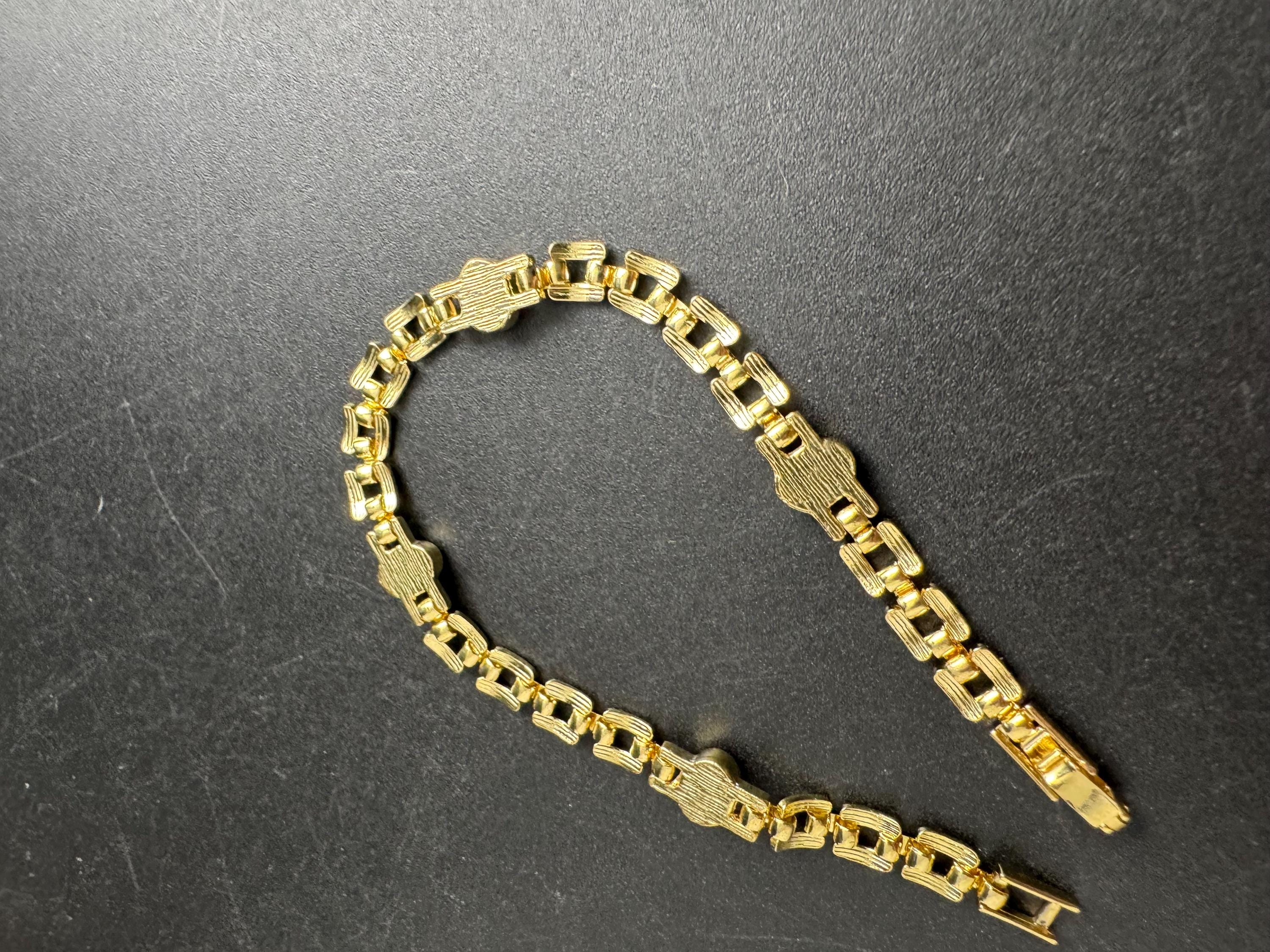 Slim Panther link rhinestone bracelet, bright pink oval cabochon crystals gold plated