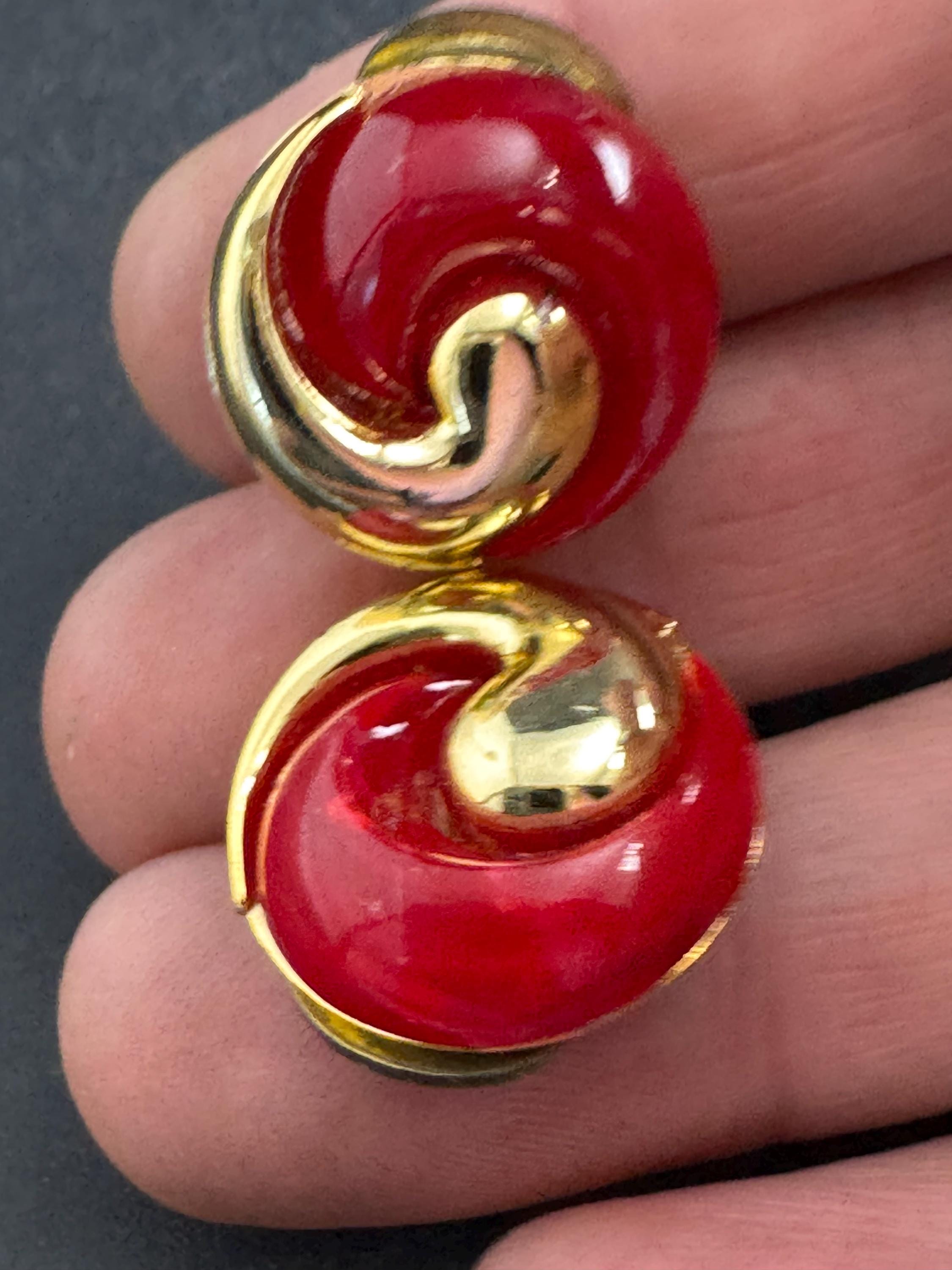 Bright red gold clip on earrings, vintage early plastic swirl
