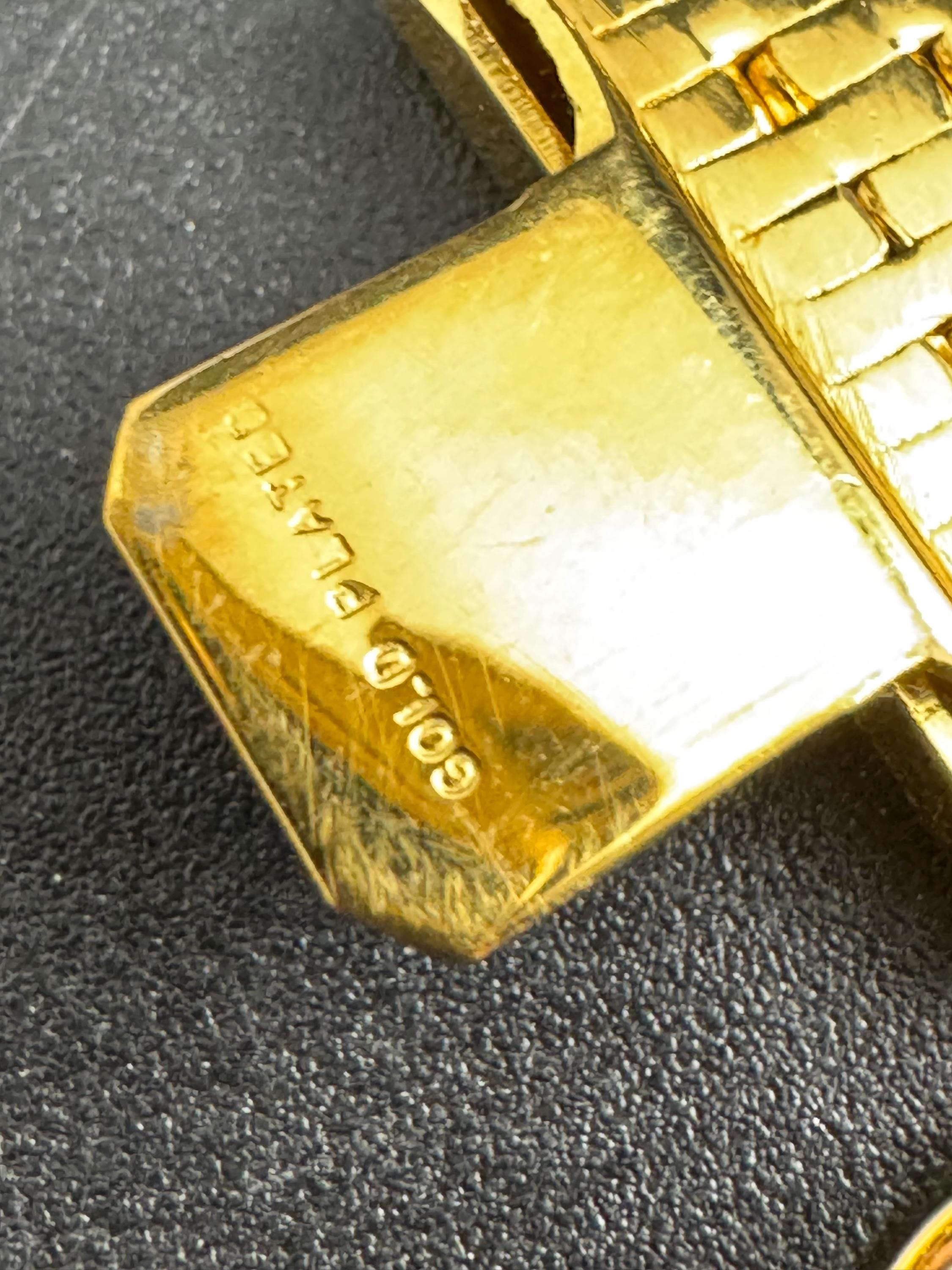 Wide gold plated flat bracelet, articulated 1970s