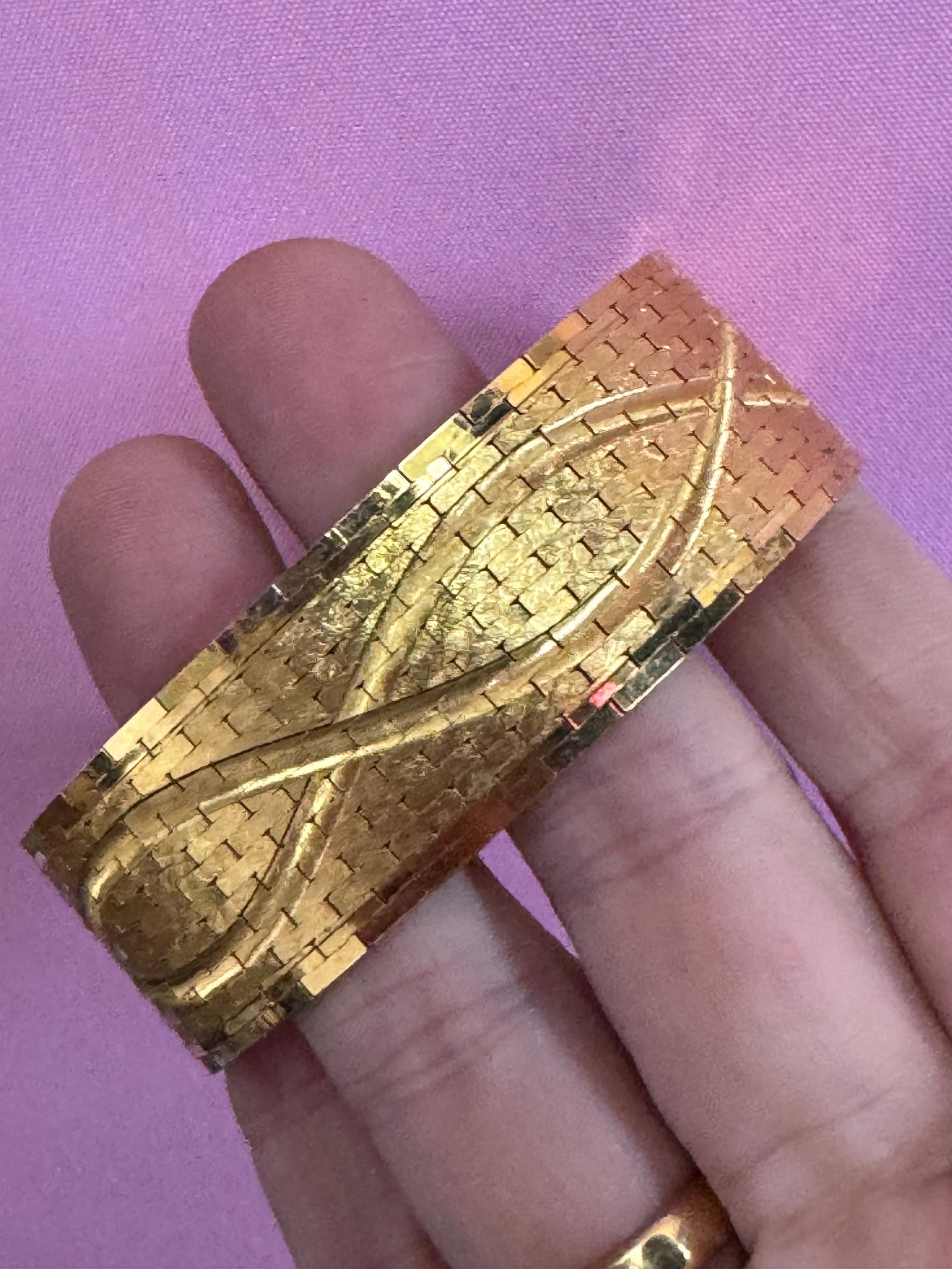 Wide gold plated flat bracelet, articulated 1970s