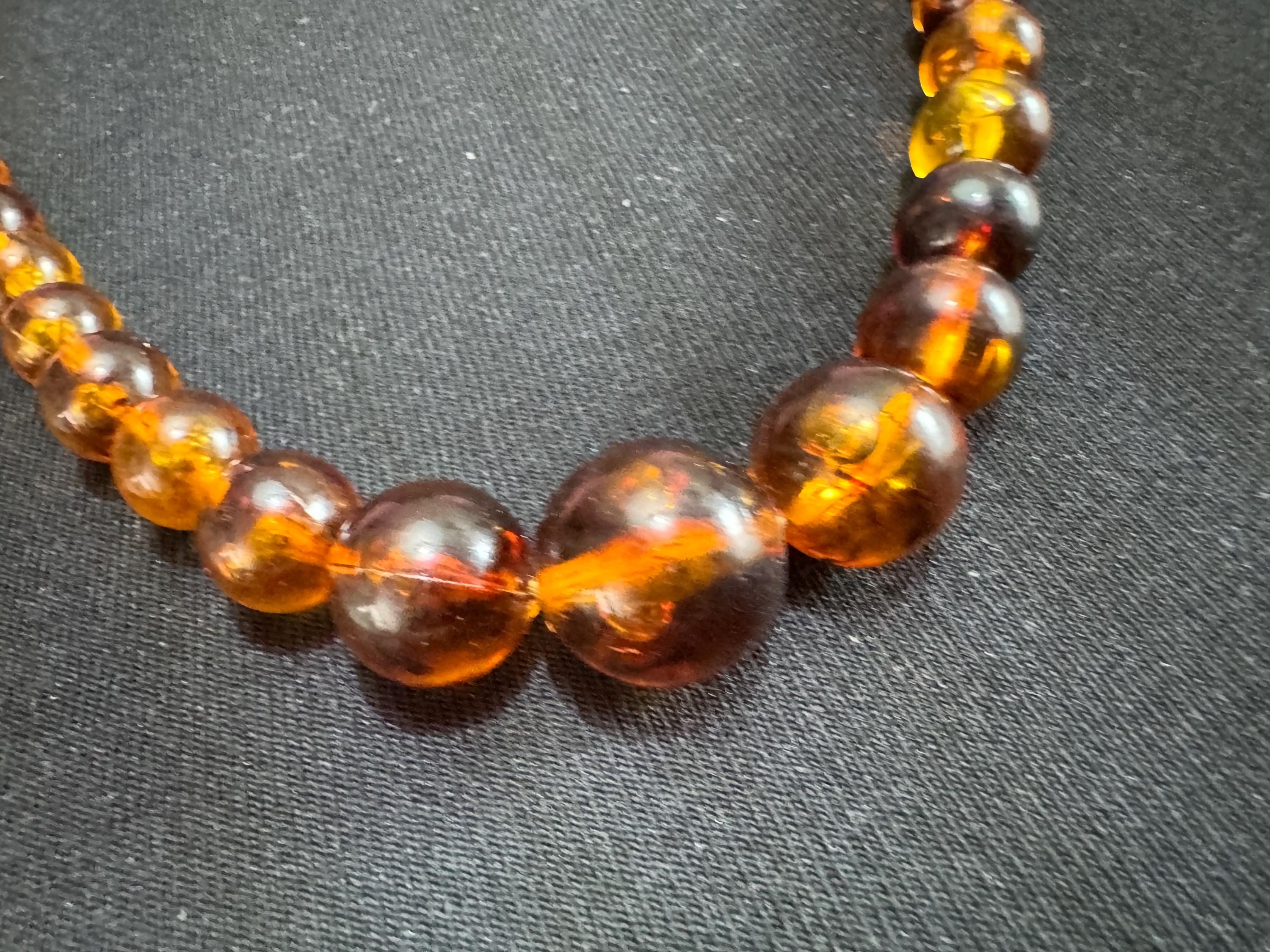 Long Faux Amber orange brown beaded necklace, plastic beads