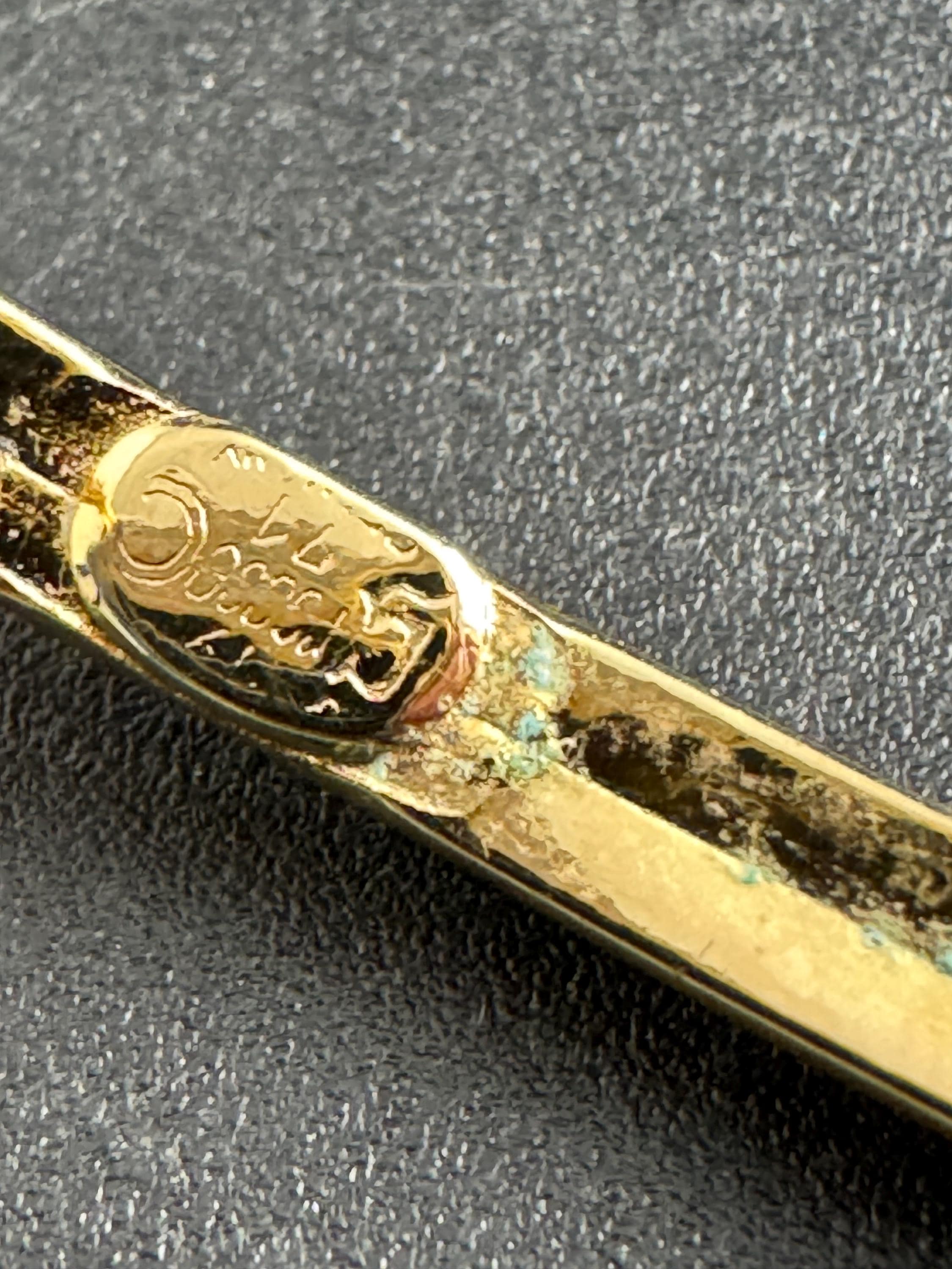 Grosse gold plated slim bangle dated 1971 , 1970s designer bracelet signed jewellery