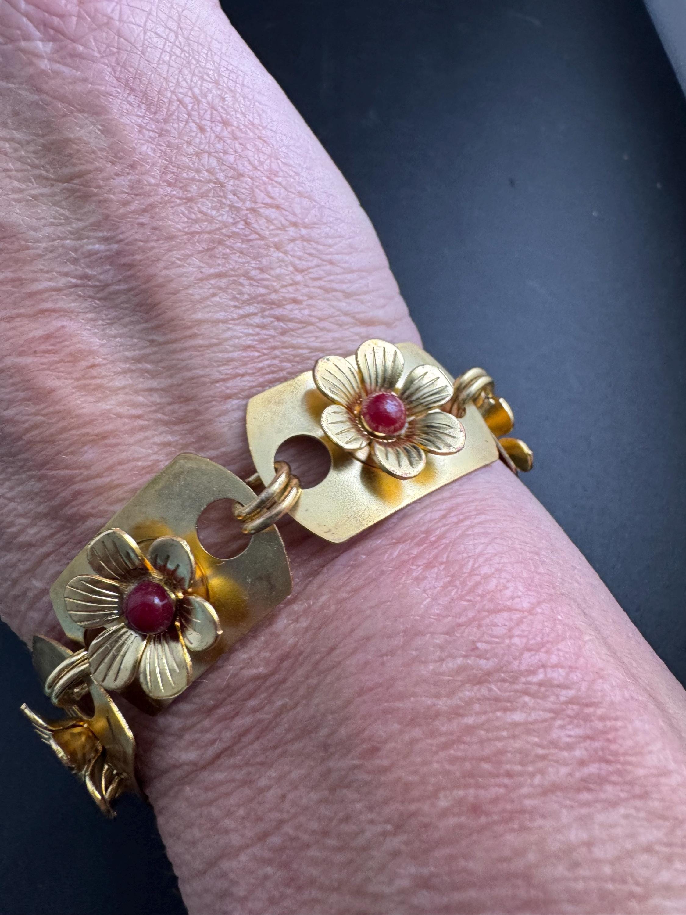 Art deco brass panel link flower bracelet , red cabochons vintage unused mid century