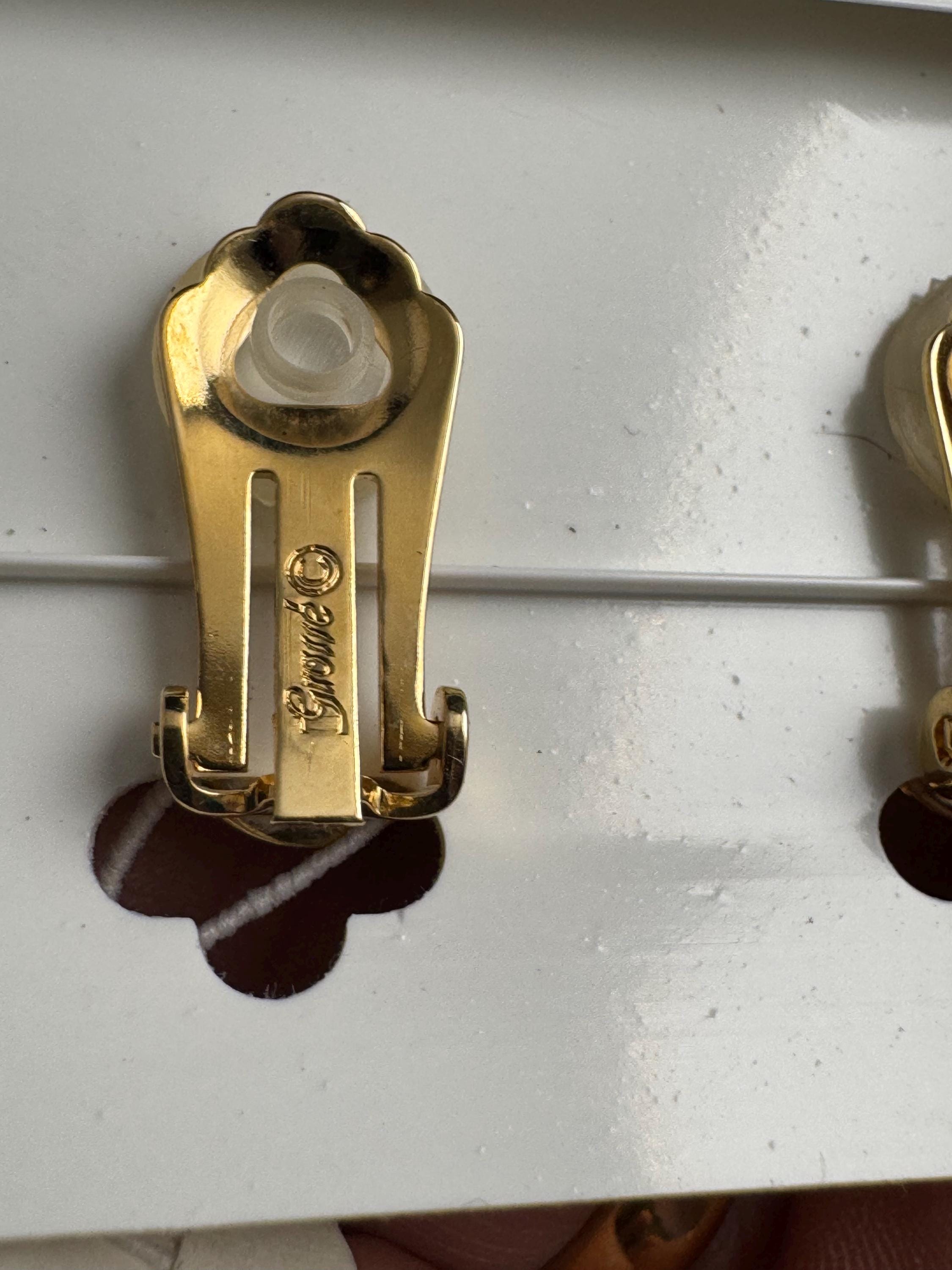 Grosse gold plated clip on earrings, unused vintage stock designer and fully signed