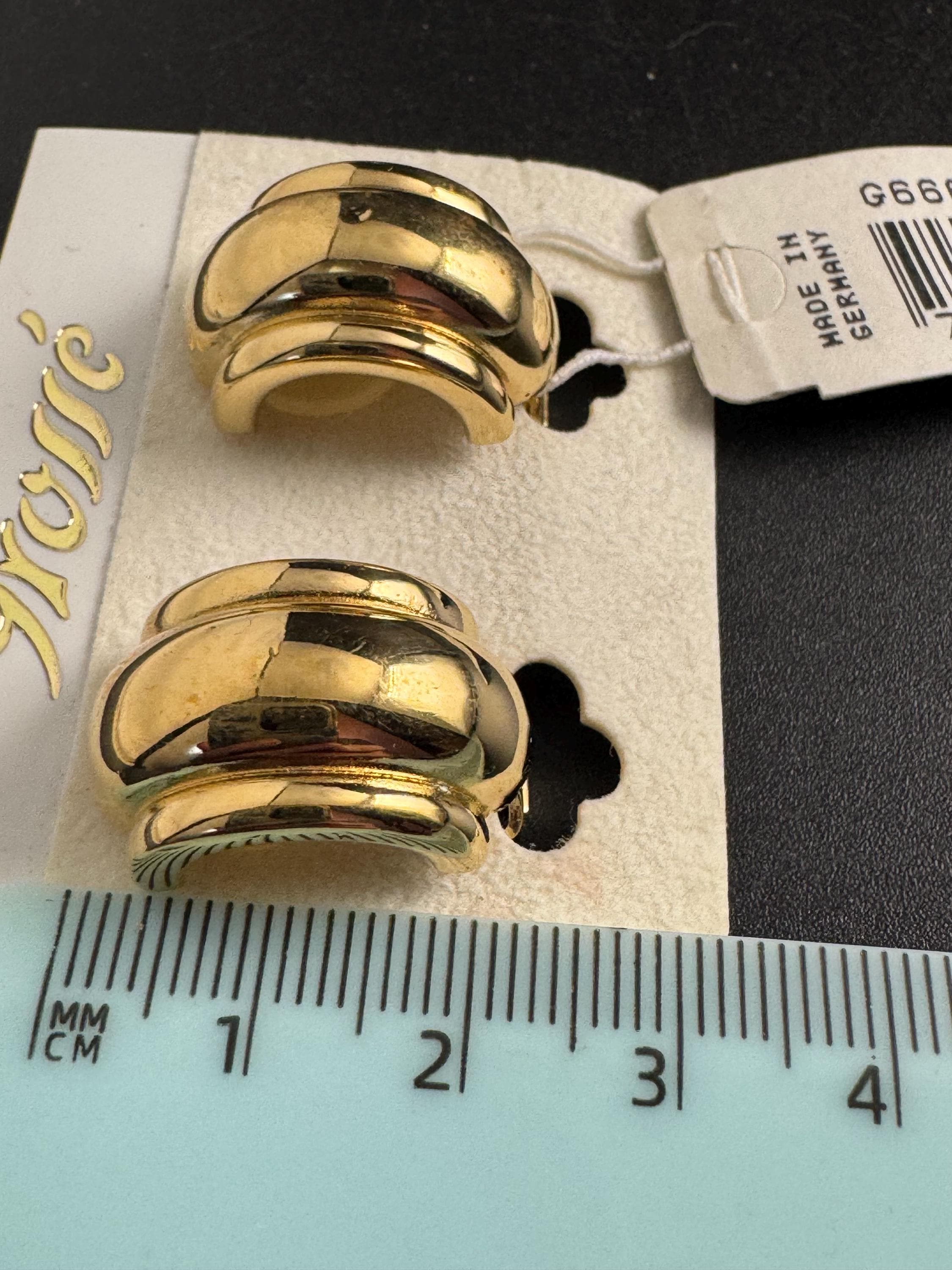 Grosse gold plated clip on earrings, unused vintage stock designer and fully signed