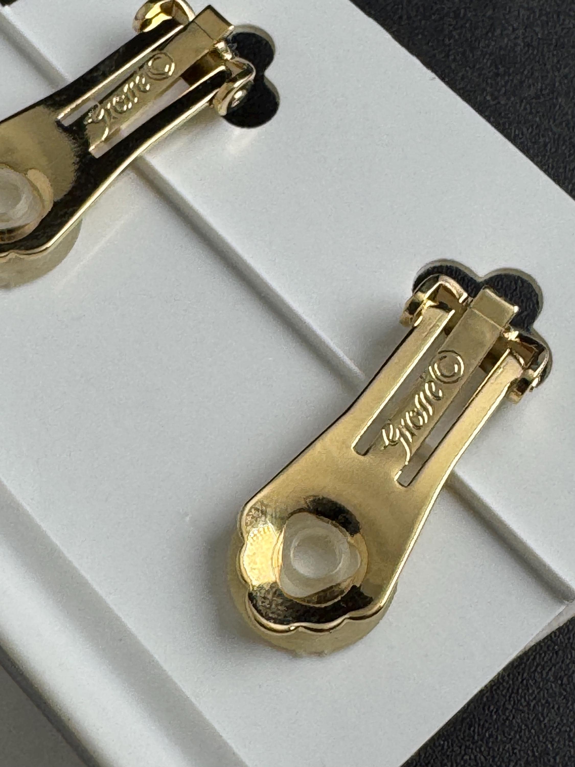 Grosse gold plated clip on earrings, unused vintage stock designer and fully signed