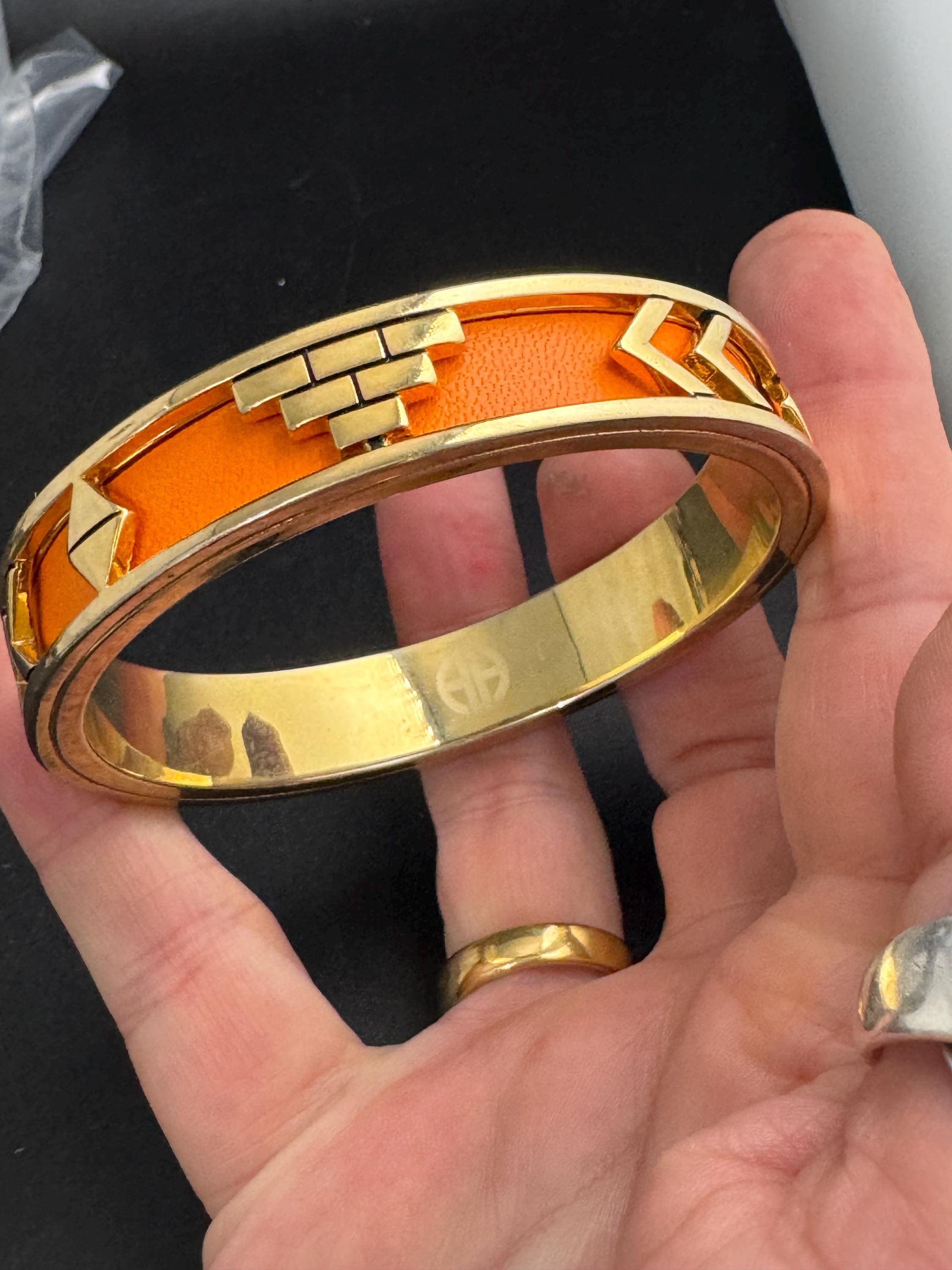 House of Harlow Orange inca bangle, enamelled 1960s gold plated
