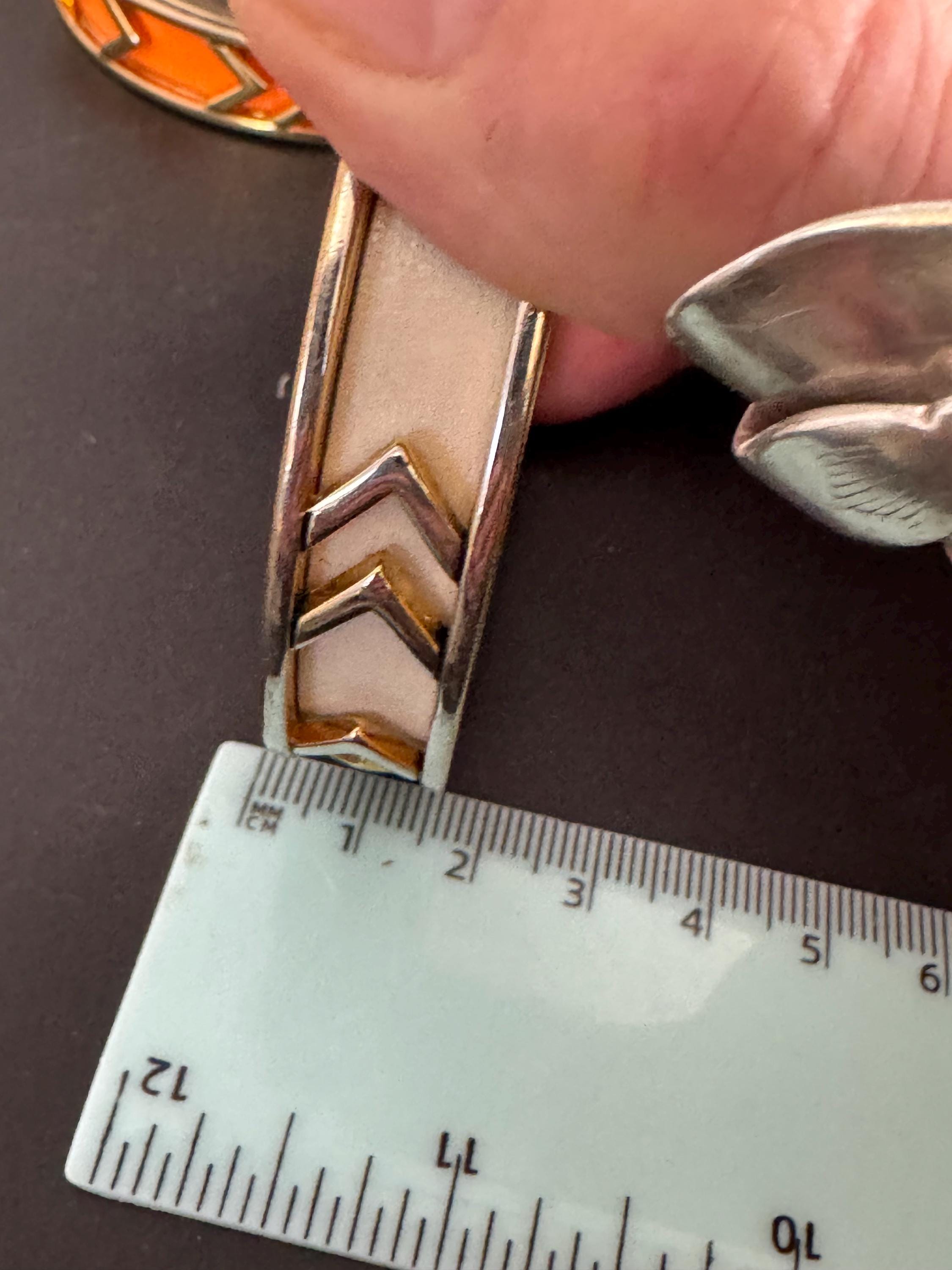 House of Harlow cream inca bangle, enamelled 1960s silver tone and gold plated