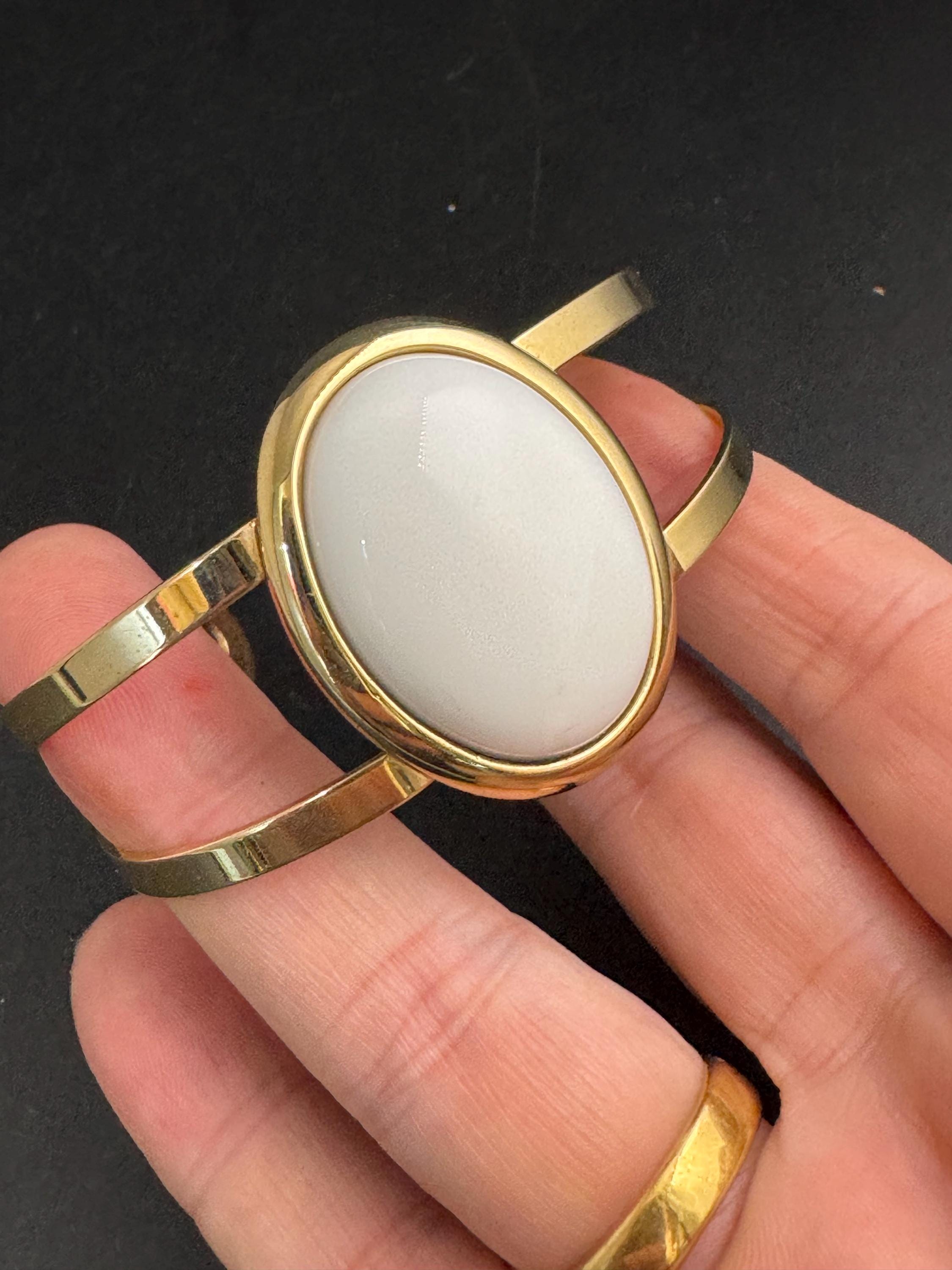 Avon white cabochon open bangle, vintage acrylic and signed
