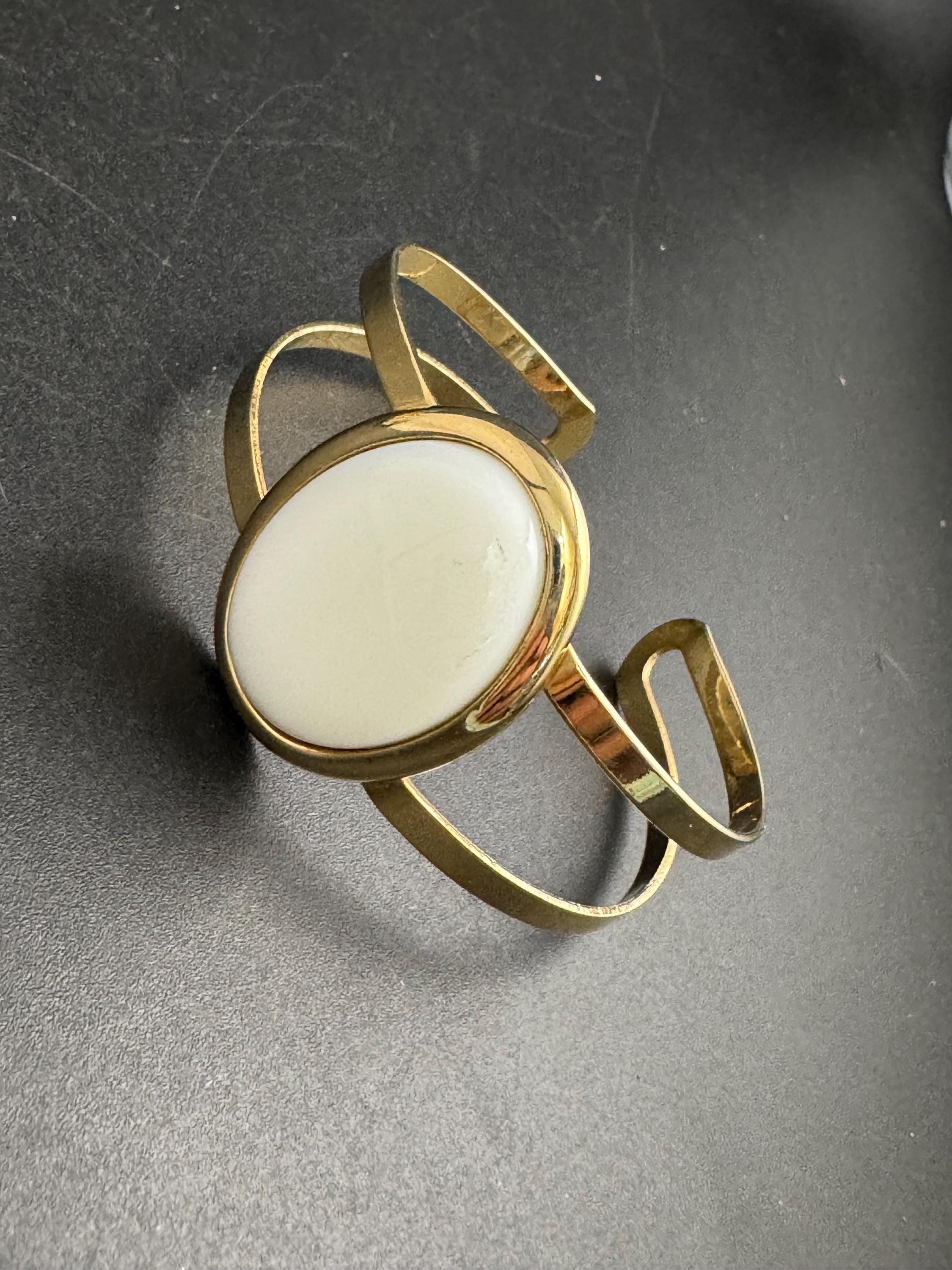 Avon white cabochon open bangle, vintage acrylic and signed