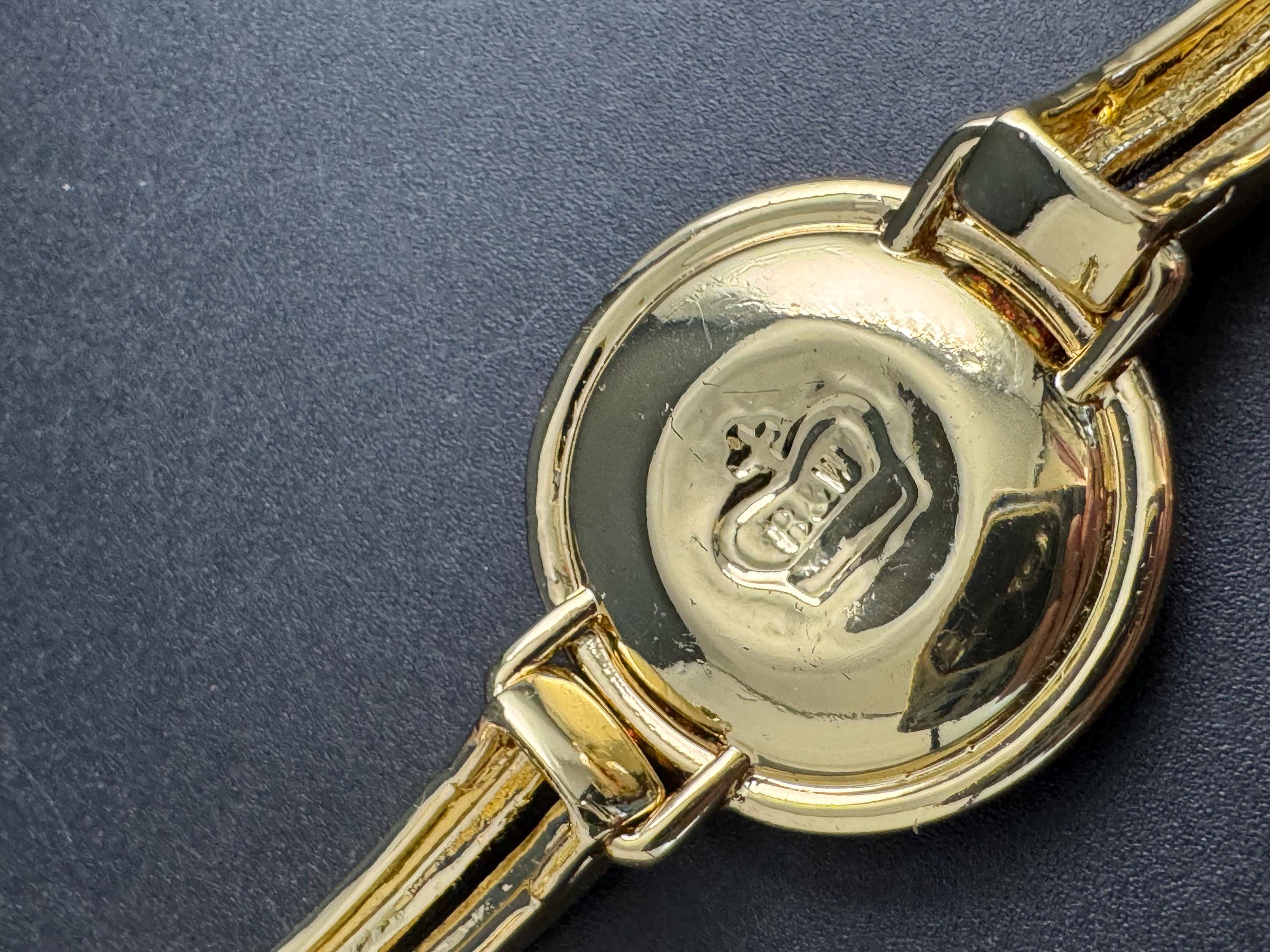 Butler & Wilson pink rhinestone bracelet, ab rhinestone crystals with green peking glass central cabochon