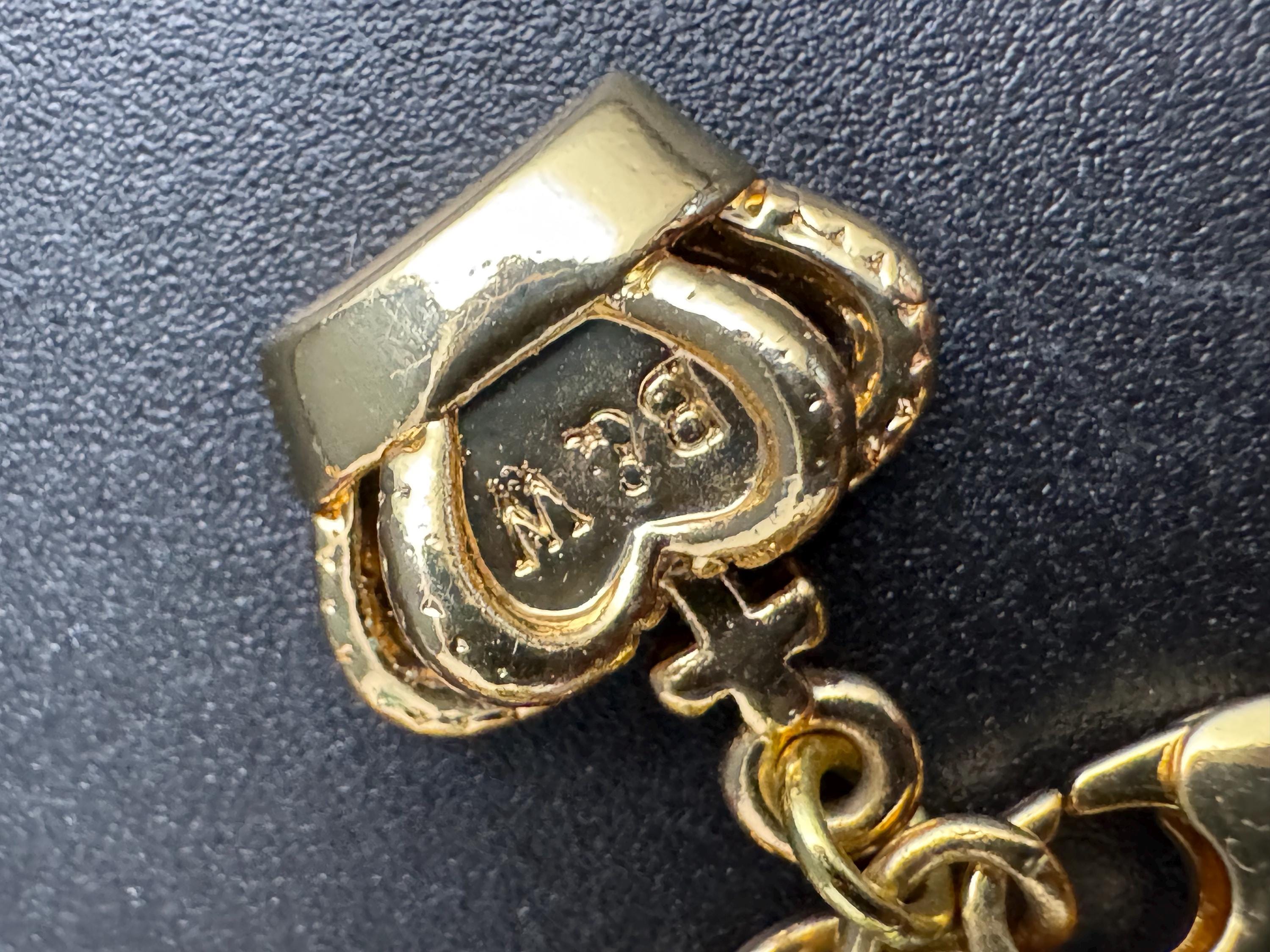 Butler & Wilson pink rhinestone bracelet, ab rhinestone crystals with green peking glass central cabochon