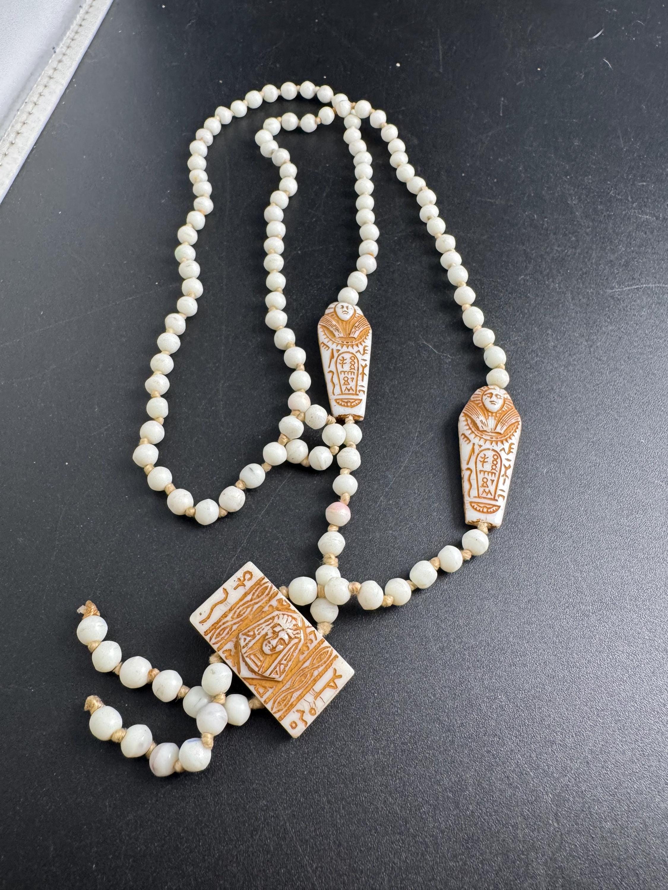 neiger UV coffin necklace, cream beads 84cm uranium glass