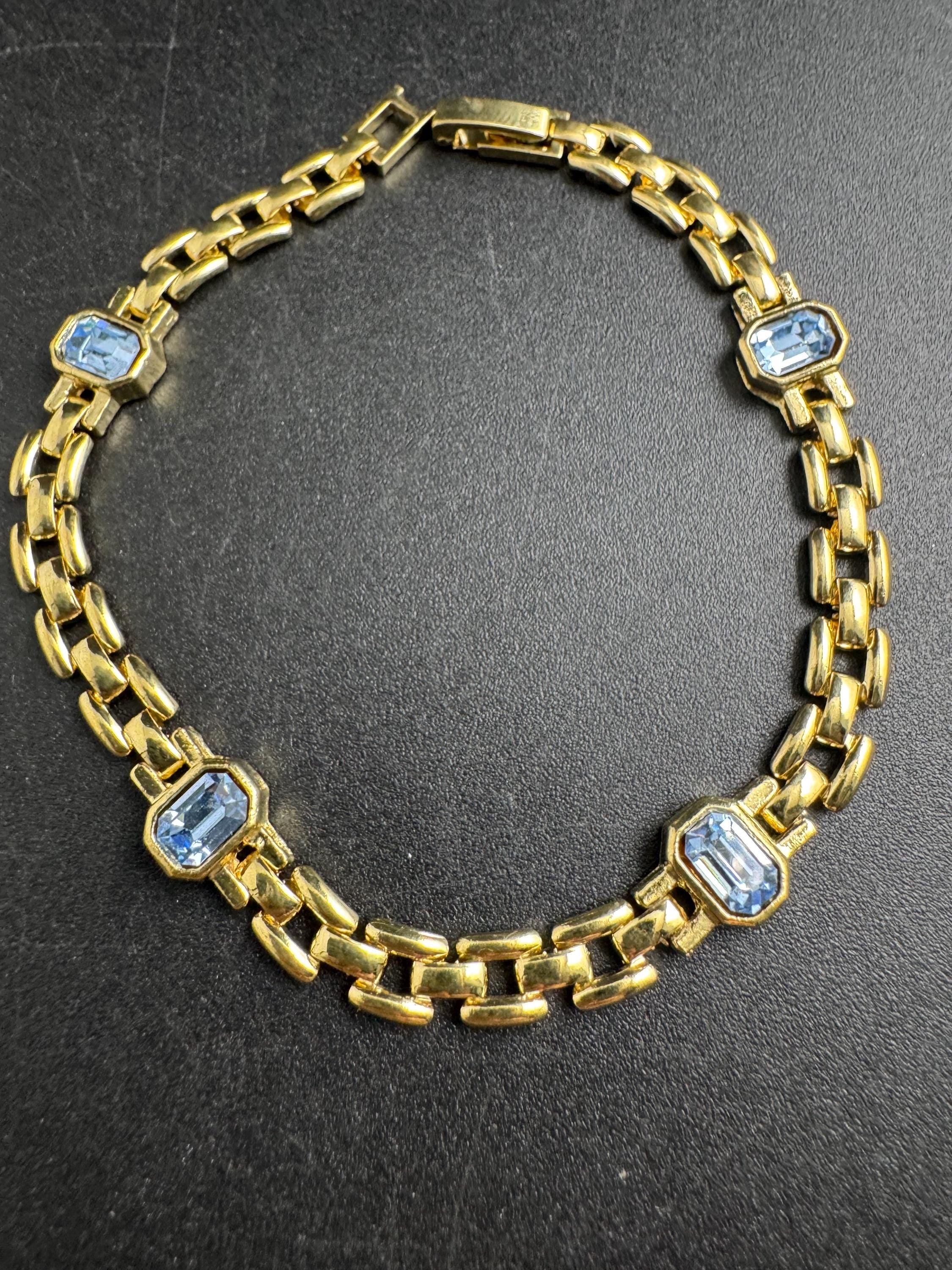 Slim Panther link rhinestone bracelet, light sapphire blue octagon Swarovski crystals gold plated