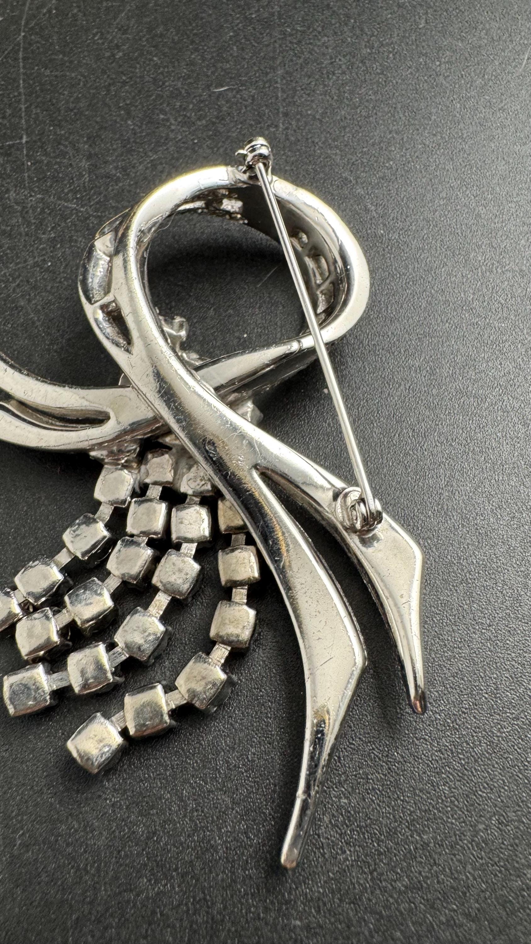 Large clear rhinestone tassel brooch, chrome back vintage quality