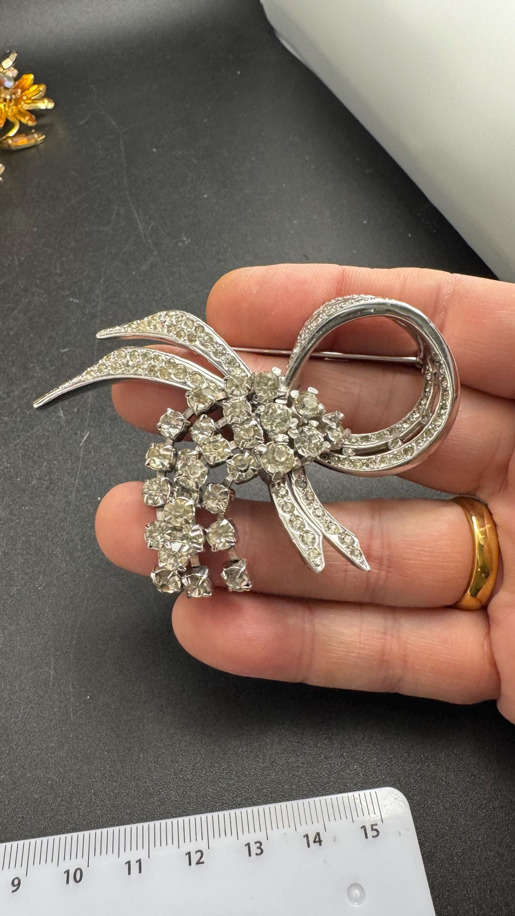 Large clear rhinestone tassel brooch, chrome back vintage quality