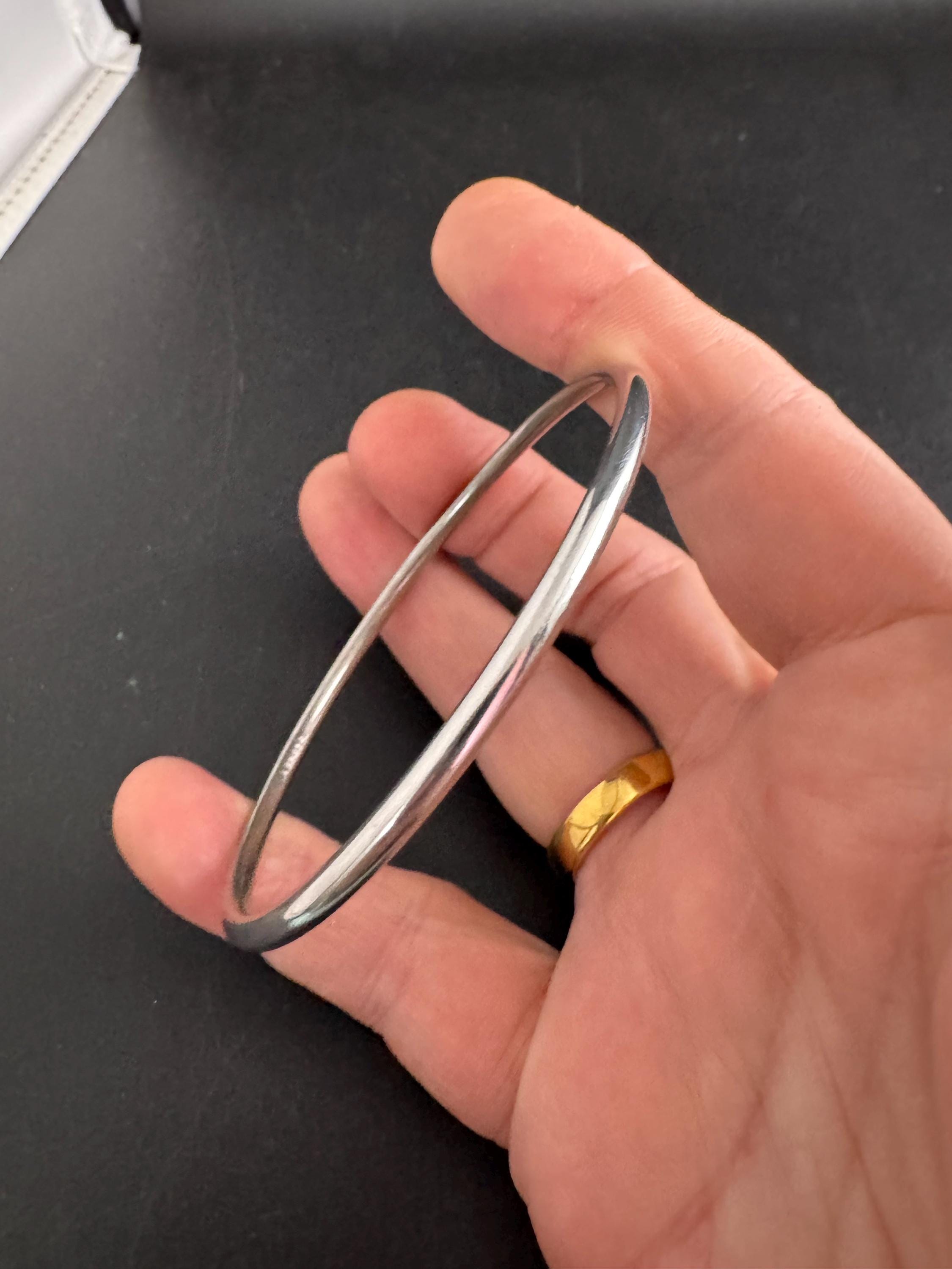 Monet slim stacking bangle , silver tone vintage and signed