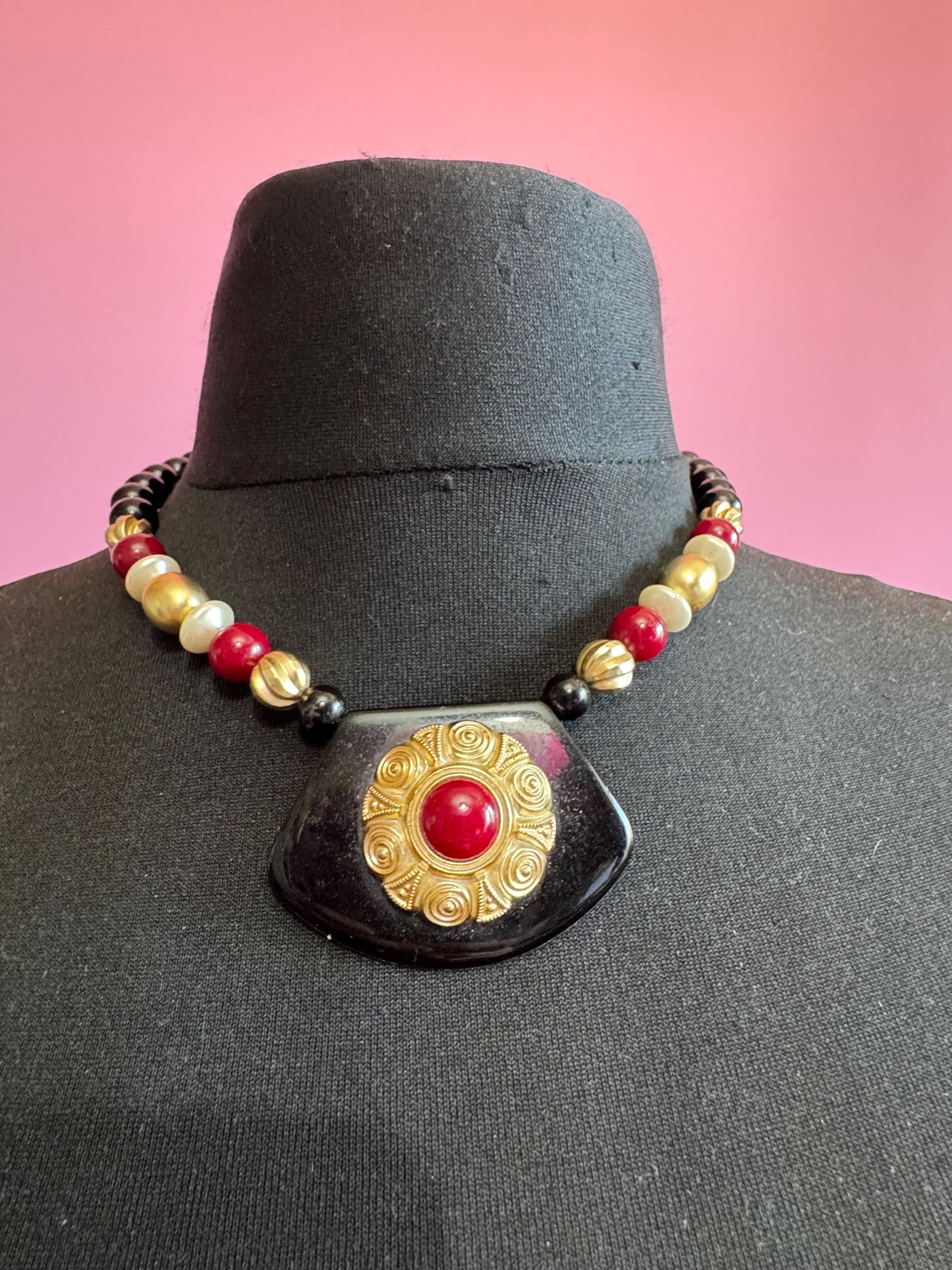 Black beaded statement necklace, red gold acrylic pendant