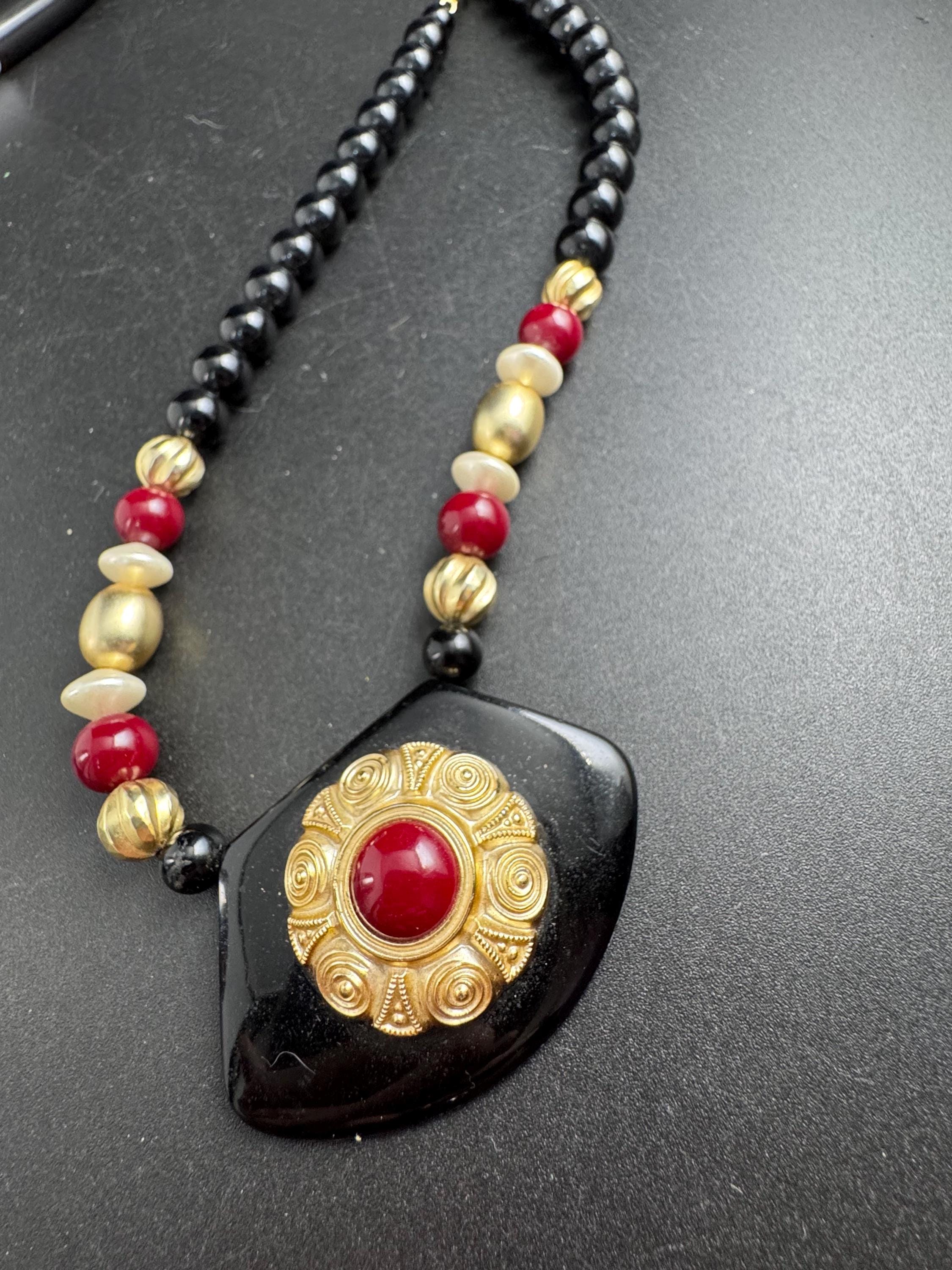 Black beaded statement necklace, red gold acrylic pendant