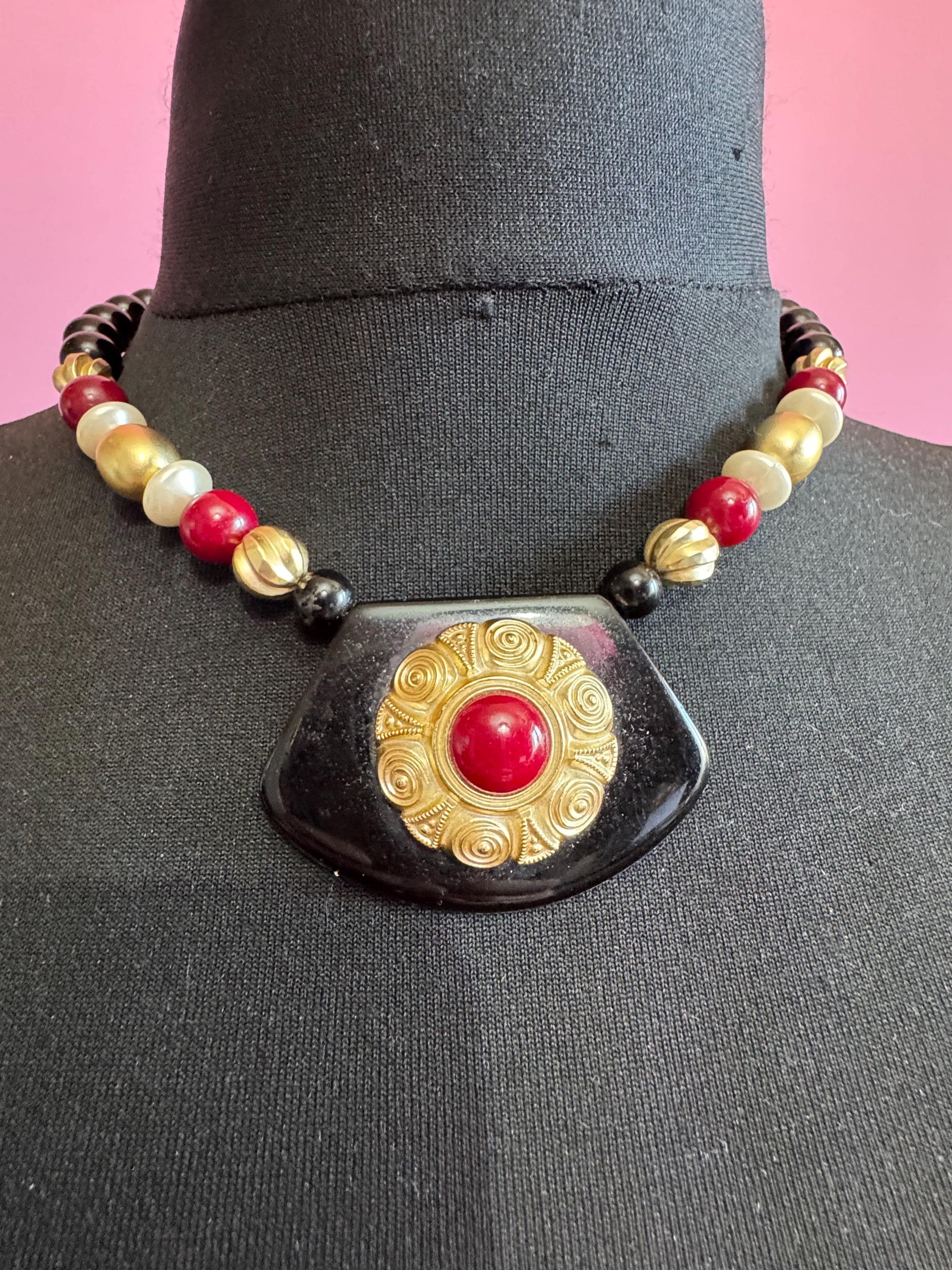 Black beaded statement necklace, red gold acrylic pendant