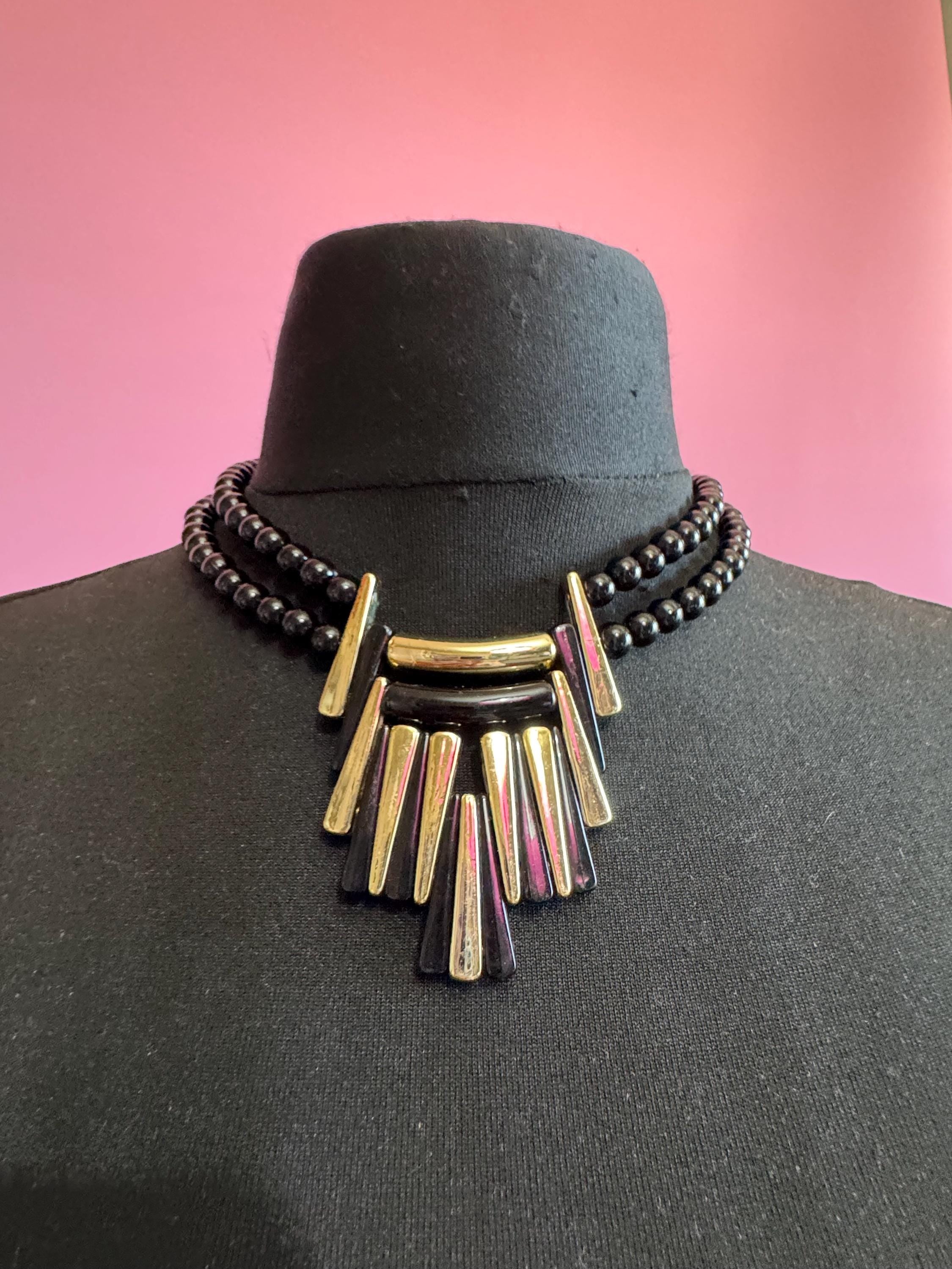 Black and gold beaded statement necklace, acrylic deco style pendant 1970s