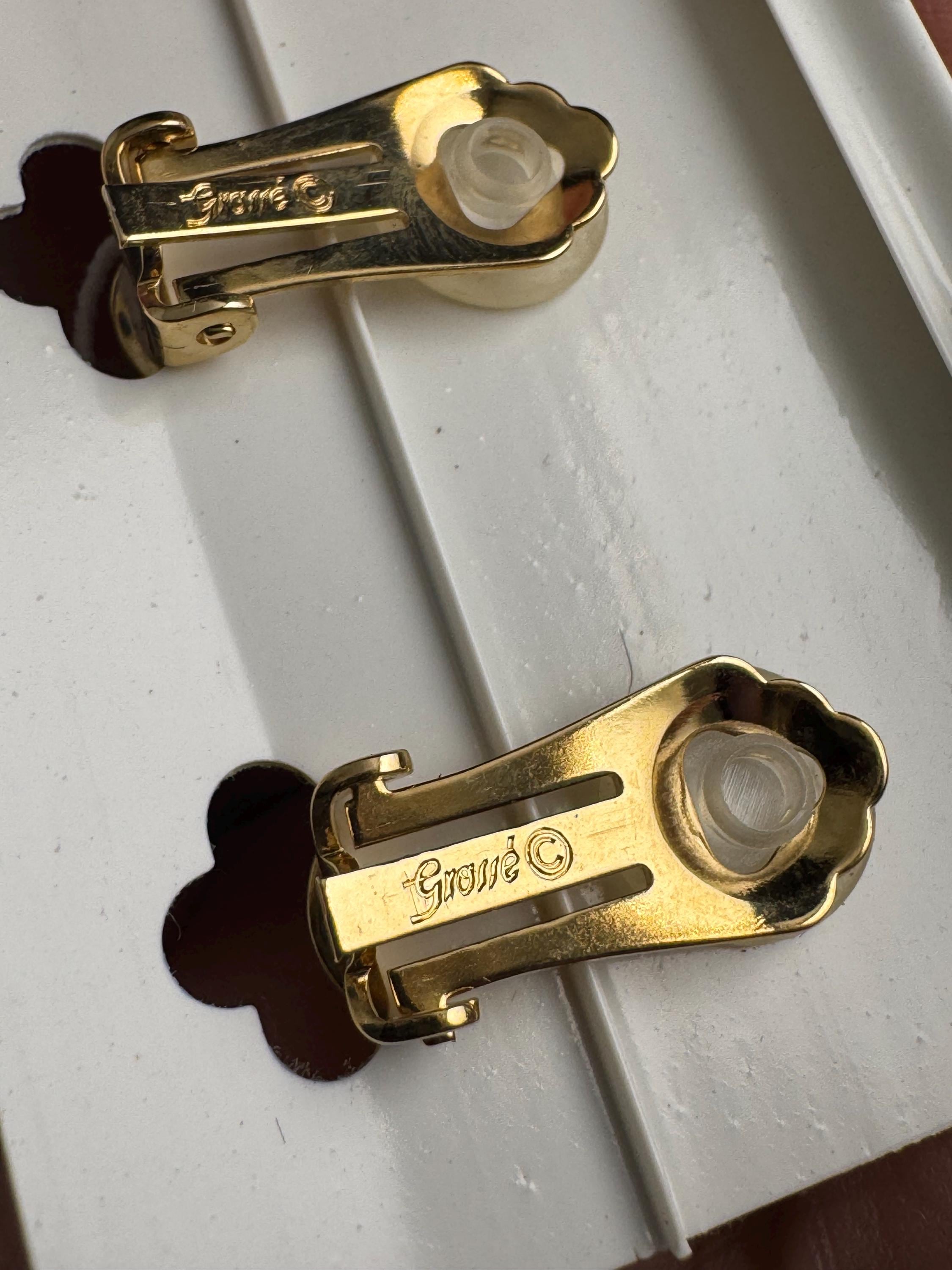 Grosse gold plated clip on earrings, unused vintage stock designer and fully signed