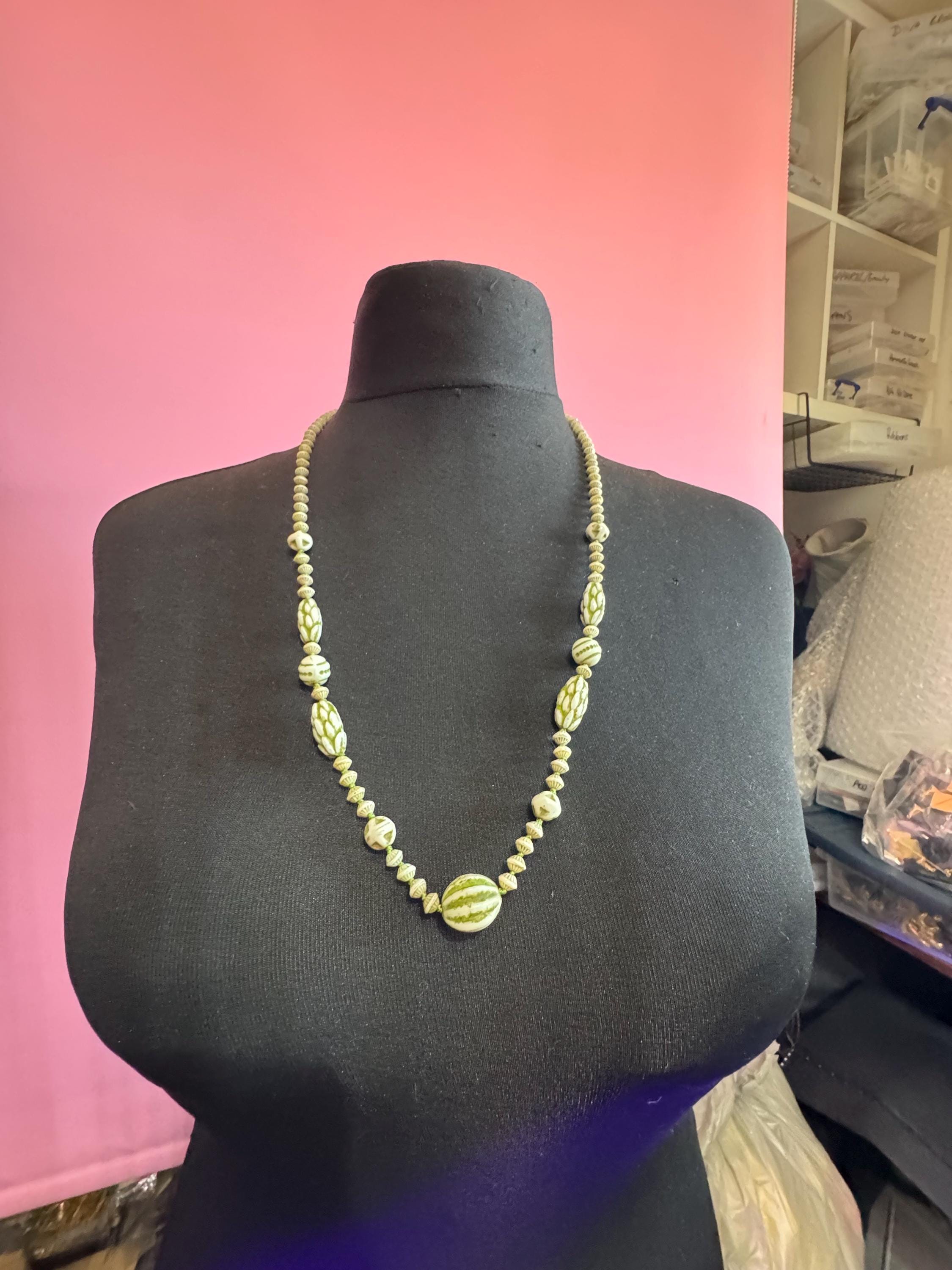 neiger UV beaded necklace, cream and green beads 76 uranium glass